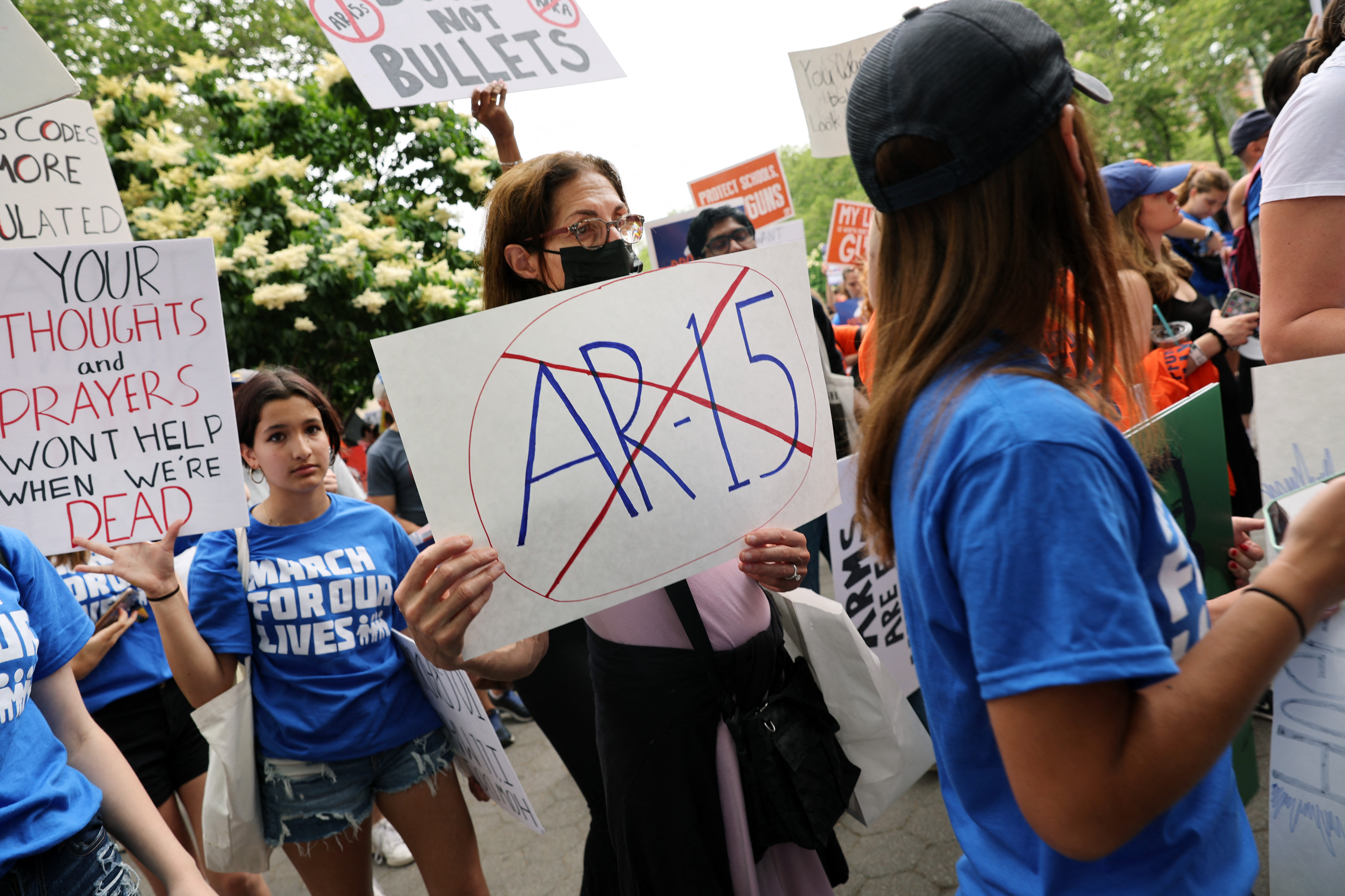 People prepare to march across the Brooklyn Bridge in New York to protest against gun violence in the March for Our Lives rally on Saturday June 11, 2022 [Spencer Platt/Getty Images/via AFP]