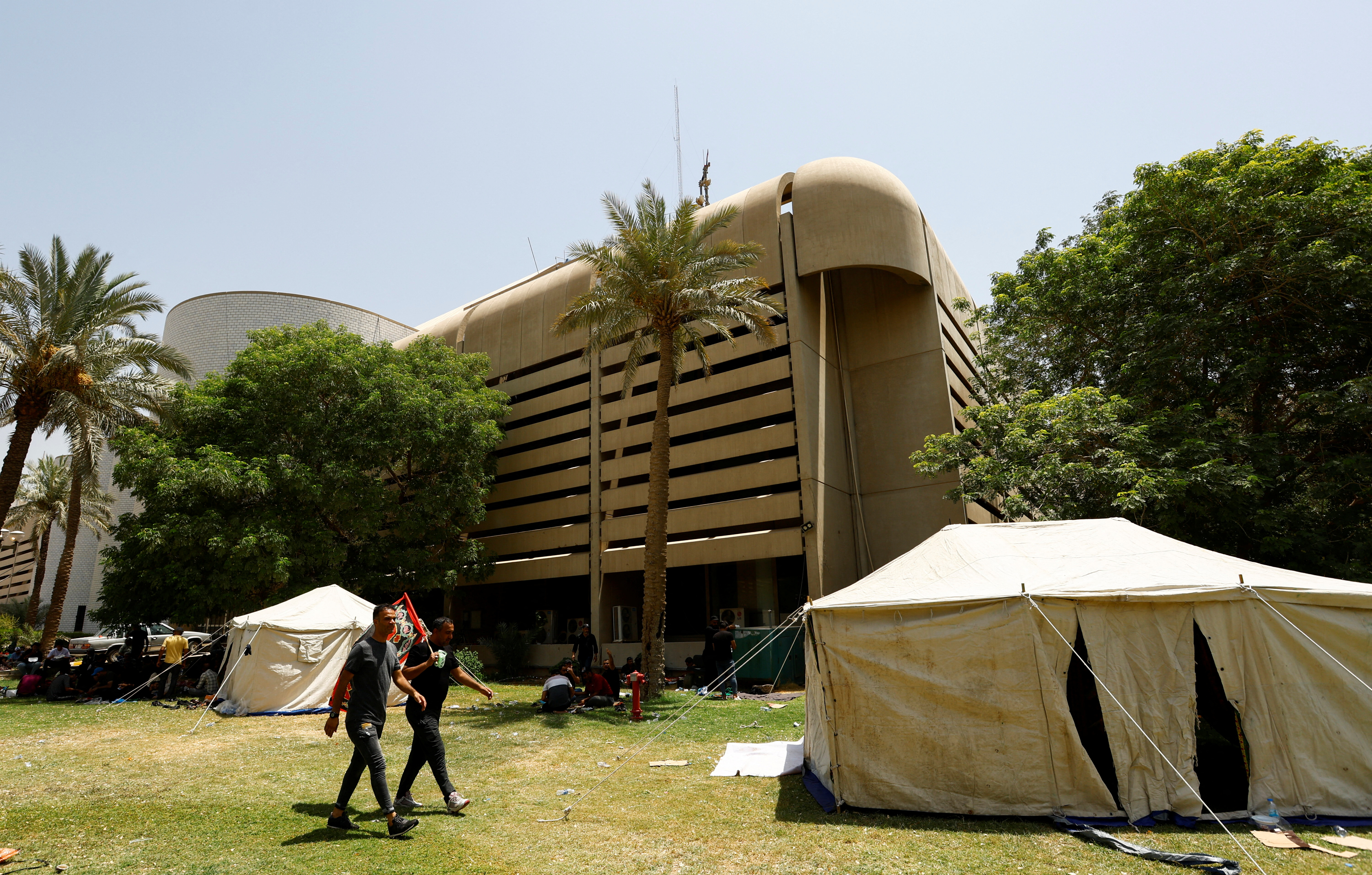 Tents for supporters of Iraqi populist leader Moqtada al-Sadr are set up during a sit-in, at the parliament building