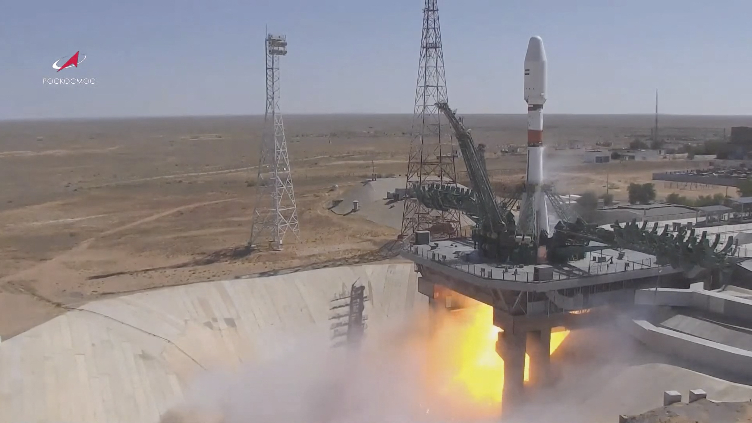 A Soyuz-2.1b rocket booster with the Iranian satellite "Khayyam" blasts off from the launchpad at the Baikonur Cosmodrome, Kazakhstan