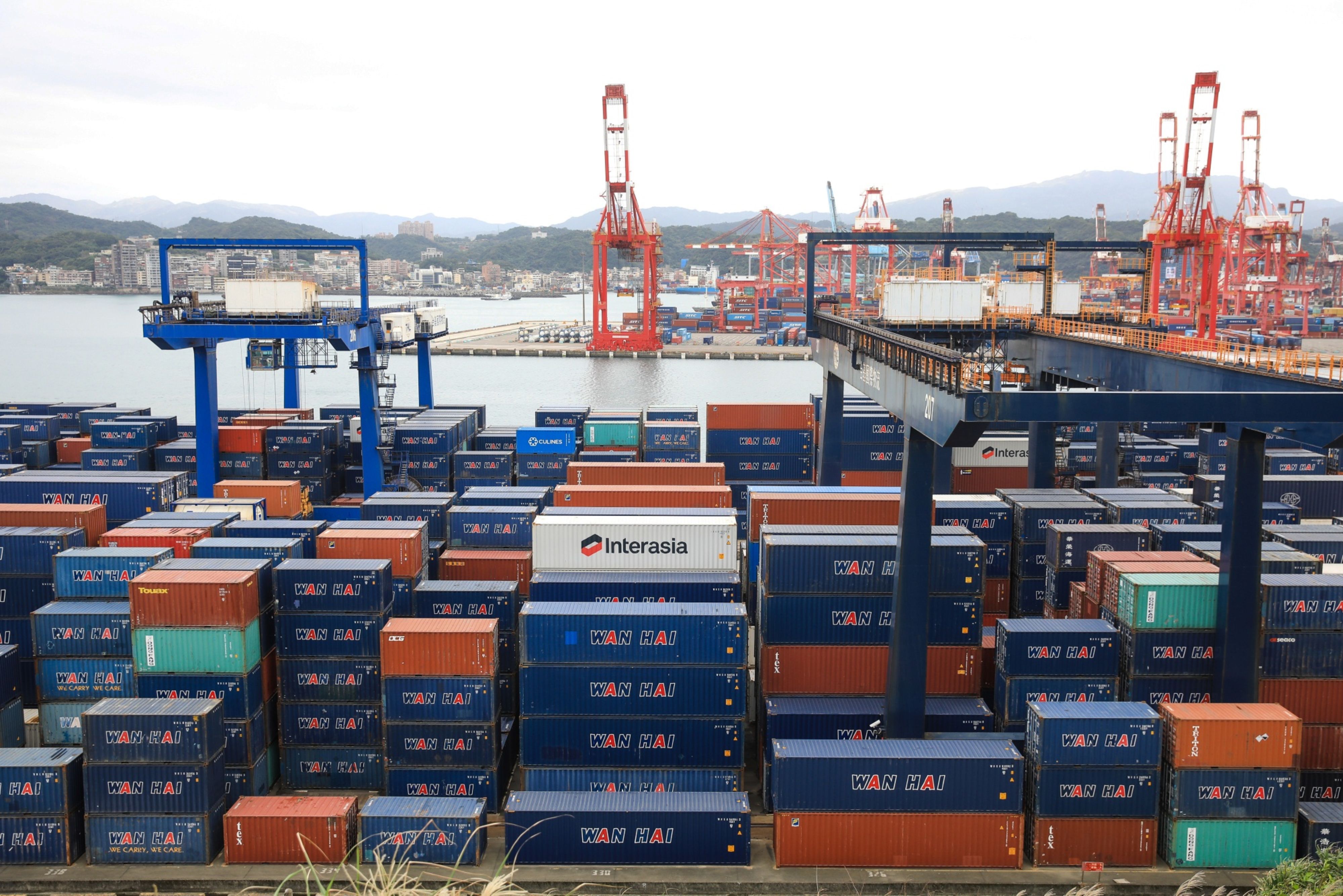 Shipping containers stacked at the Port of Keelung in Keelung, Taiwan.