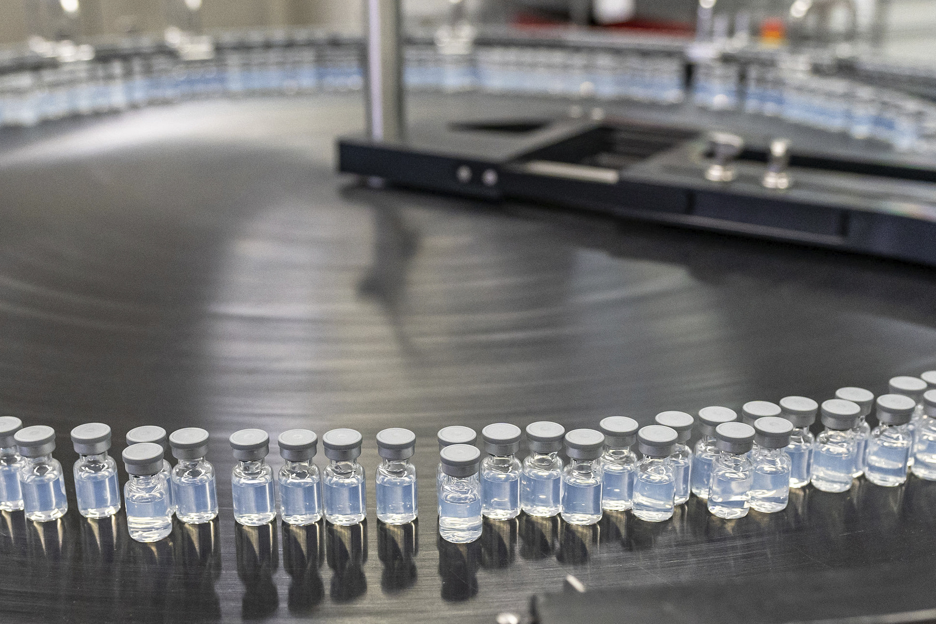 This August 2022 photo provided by Pfizer shows vials of the company&#039;s updated COVID-19 vaccine during production in Kalamazoo, United States [File: Pfizer/AP]