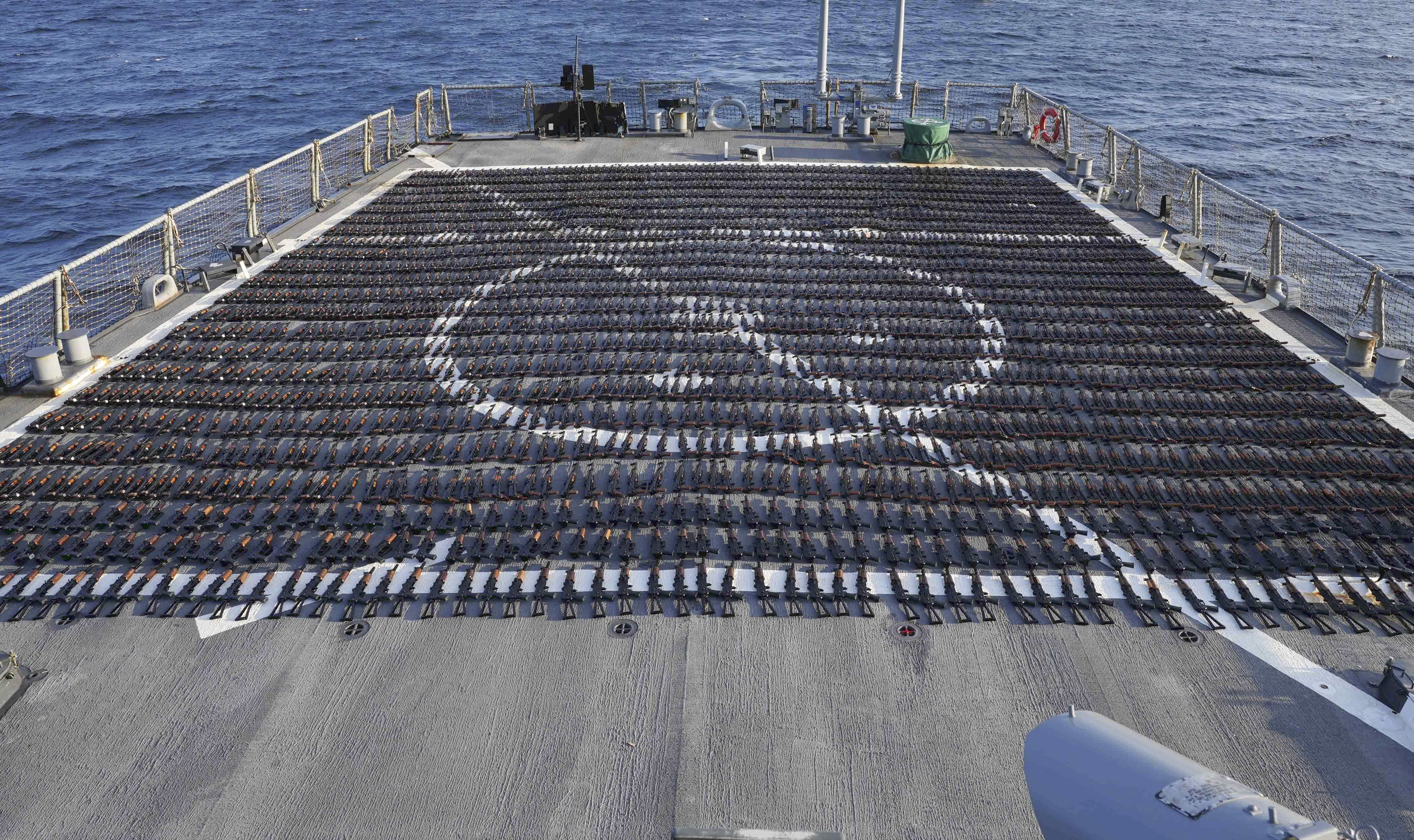 Thousands of AK-47 assault rifles on the flight deck.
