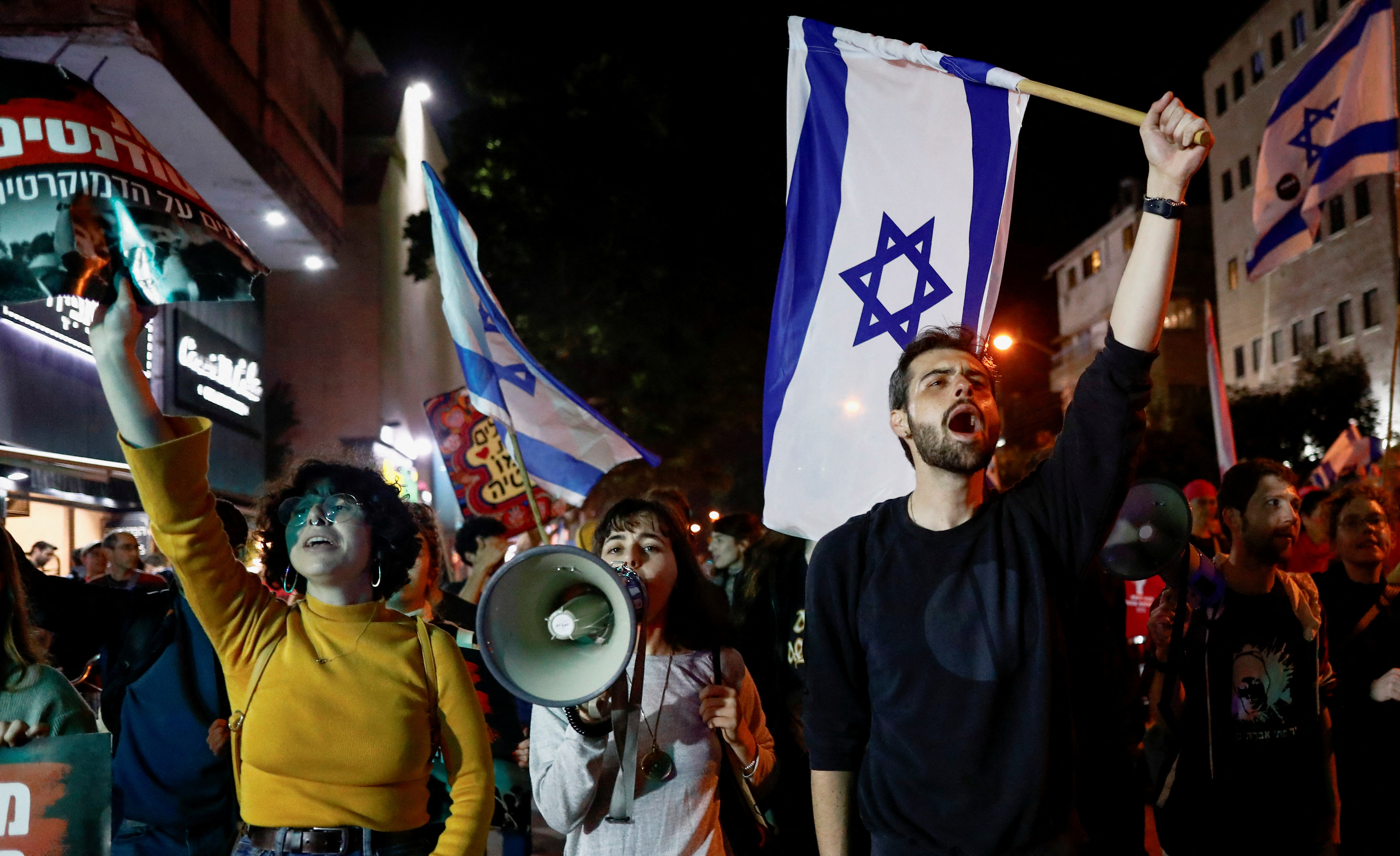 Israelis protest against Prime Minister Benjamin Netanyahu's new right-wing coalition and its proposed judicial reforms to reduce powers of the Supreme Court, in Tel Aviv, Israel January 21, 2023. REUTERS/Corinna Kern