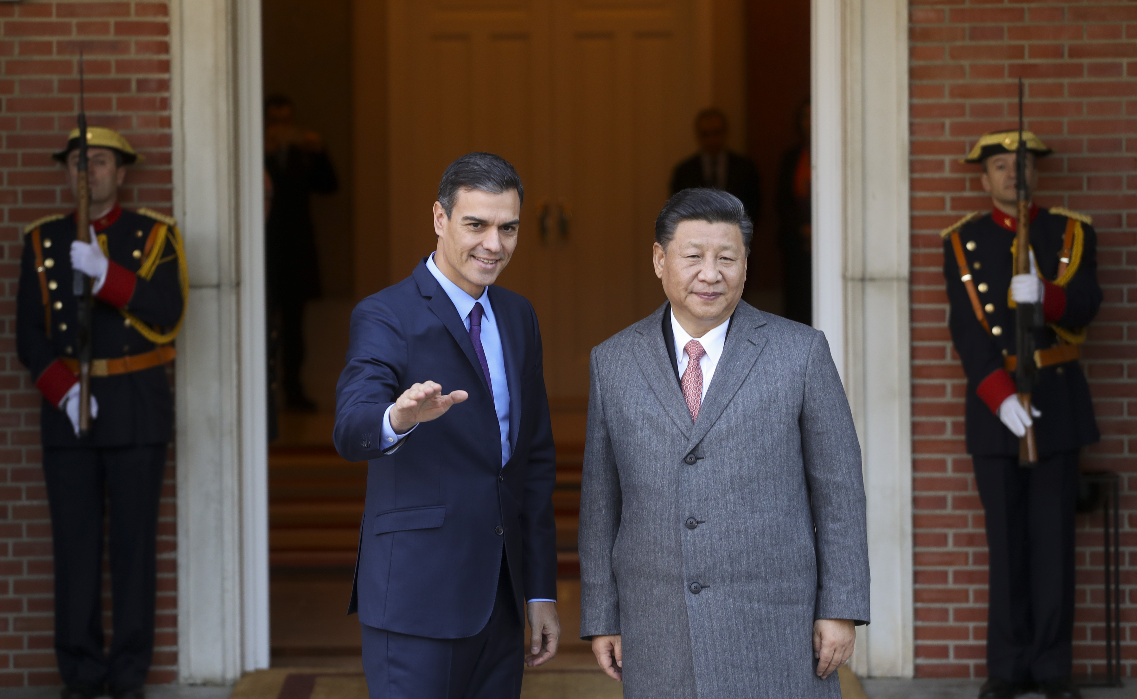 Spain's Prime Minister Pedro Sanchez gestures next to China's President Xi Jinping at the Moncloa palace in Madrid, Spain, November 28, 2018. REUTERS/Susana Vera