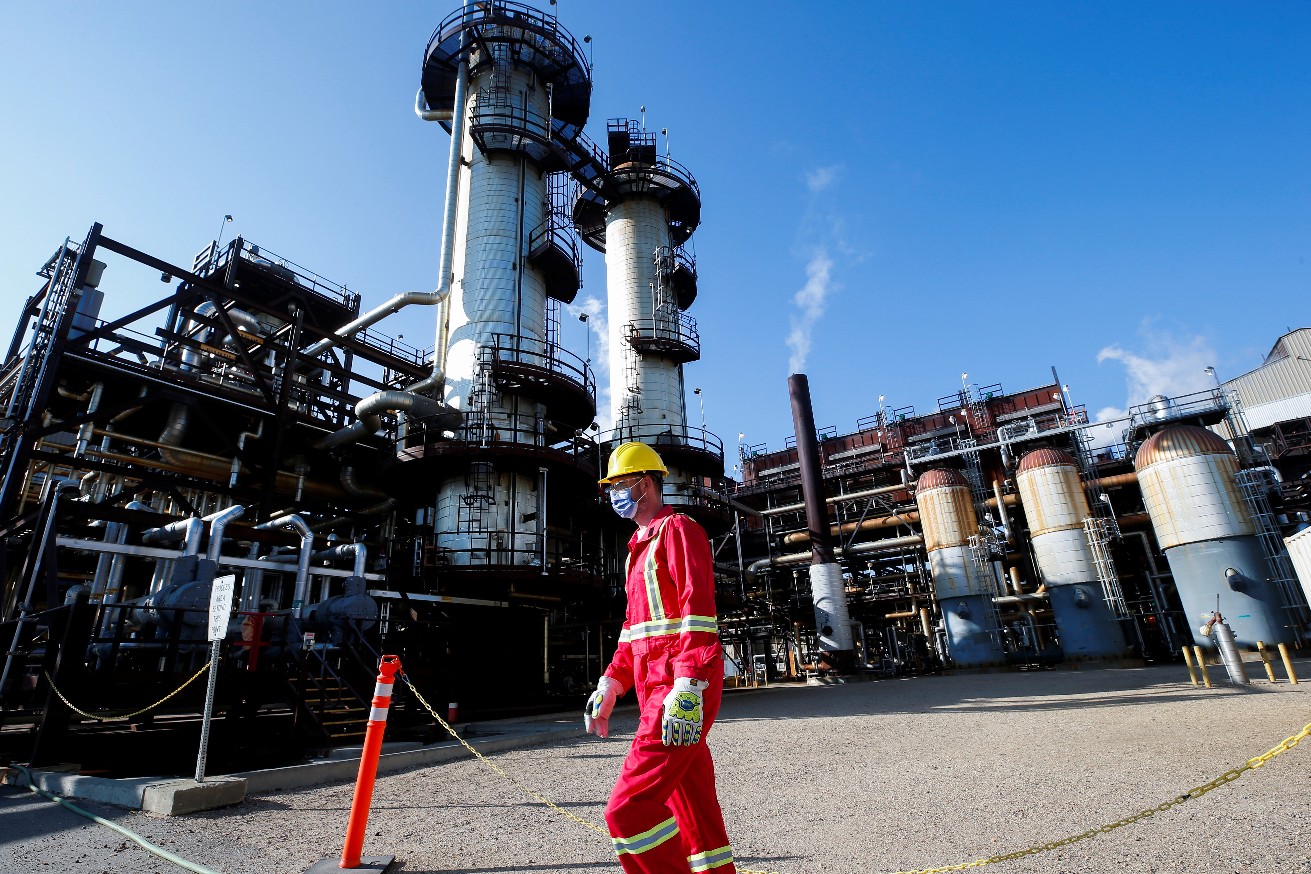 A Shell employee walks past the company&#39;s new Quest Carbon Capture and Storage (CCS) facility in Fort Saskatchewan, Alberta, Canada [File: Todd Korol/Reuters]