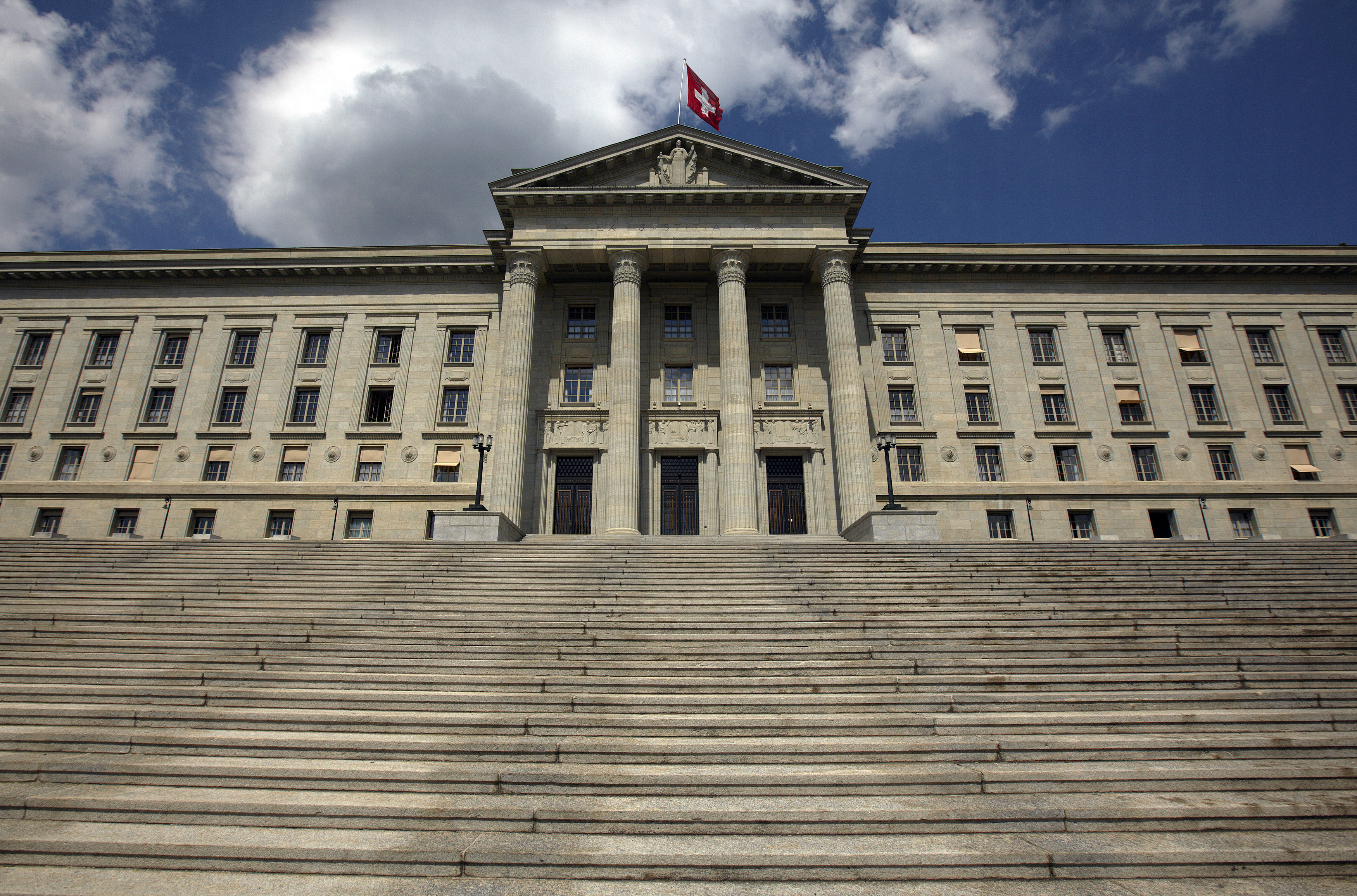 Switzerland, whose Supreme Court is pictured here, has brought charges of crimes against humanity, against a former Gambian minister. [Denis Balibouse/Reuters]