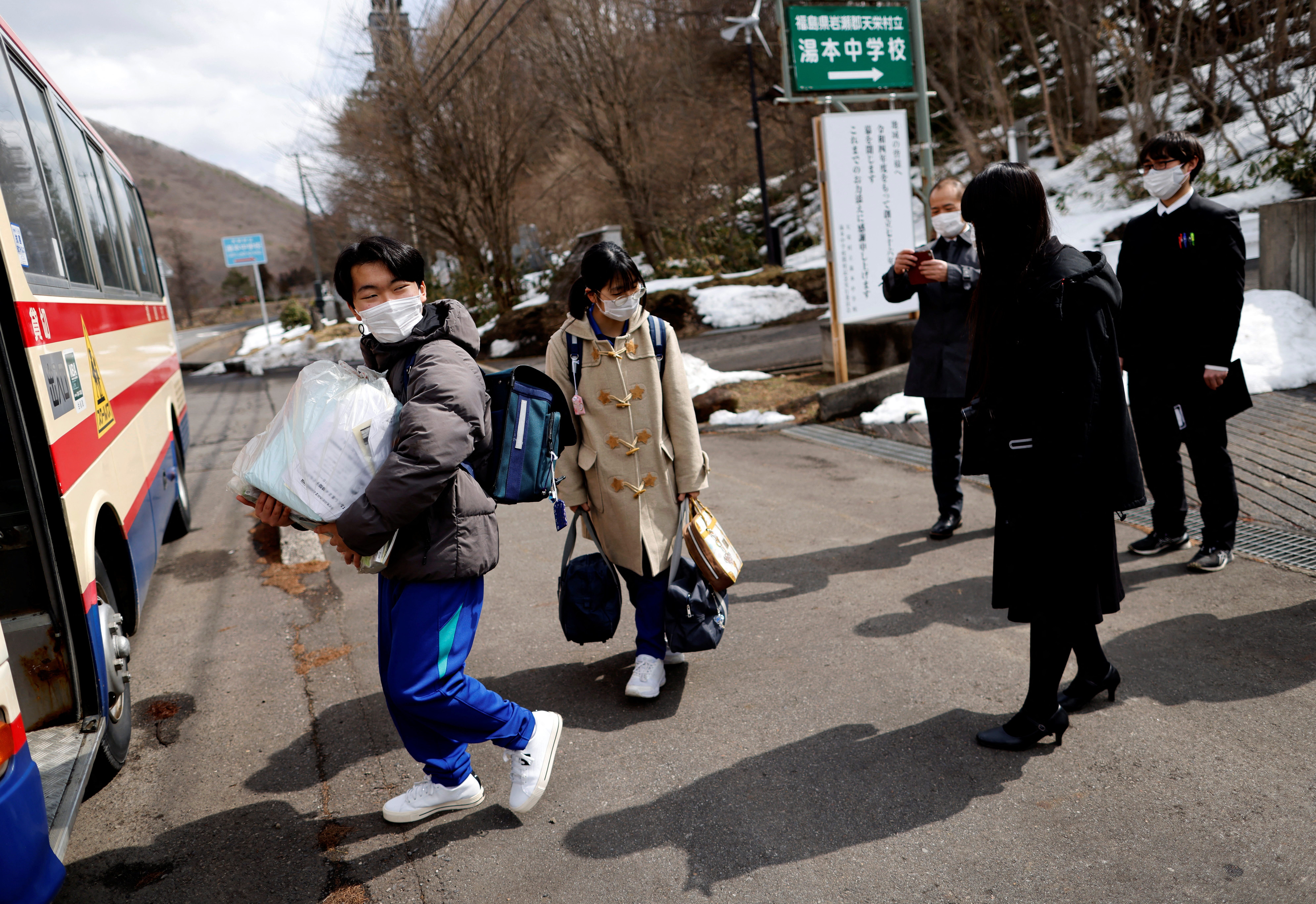 Eita Sato, 15, and Aoi Hoshi, 15, the only two students at Yumoto Junior High School