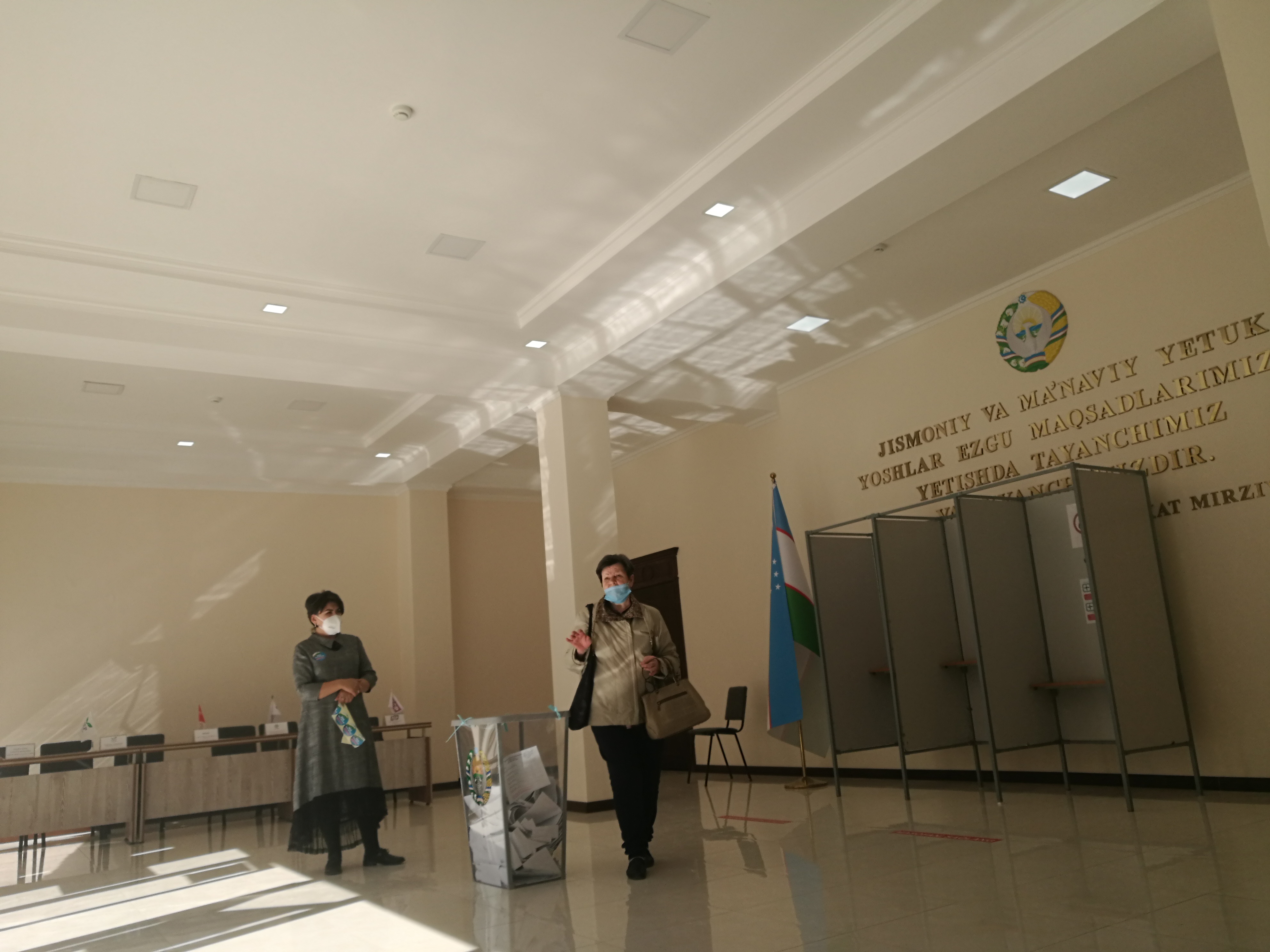 A woman casting her ballot