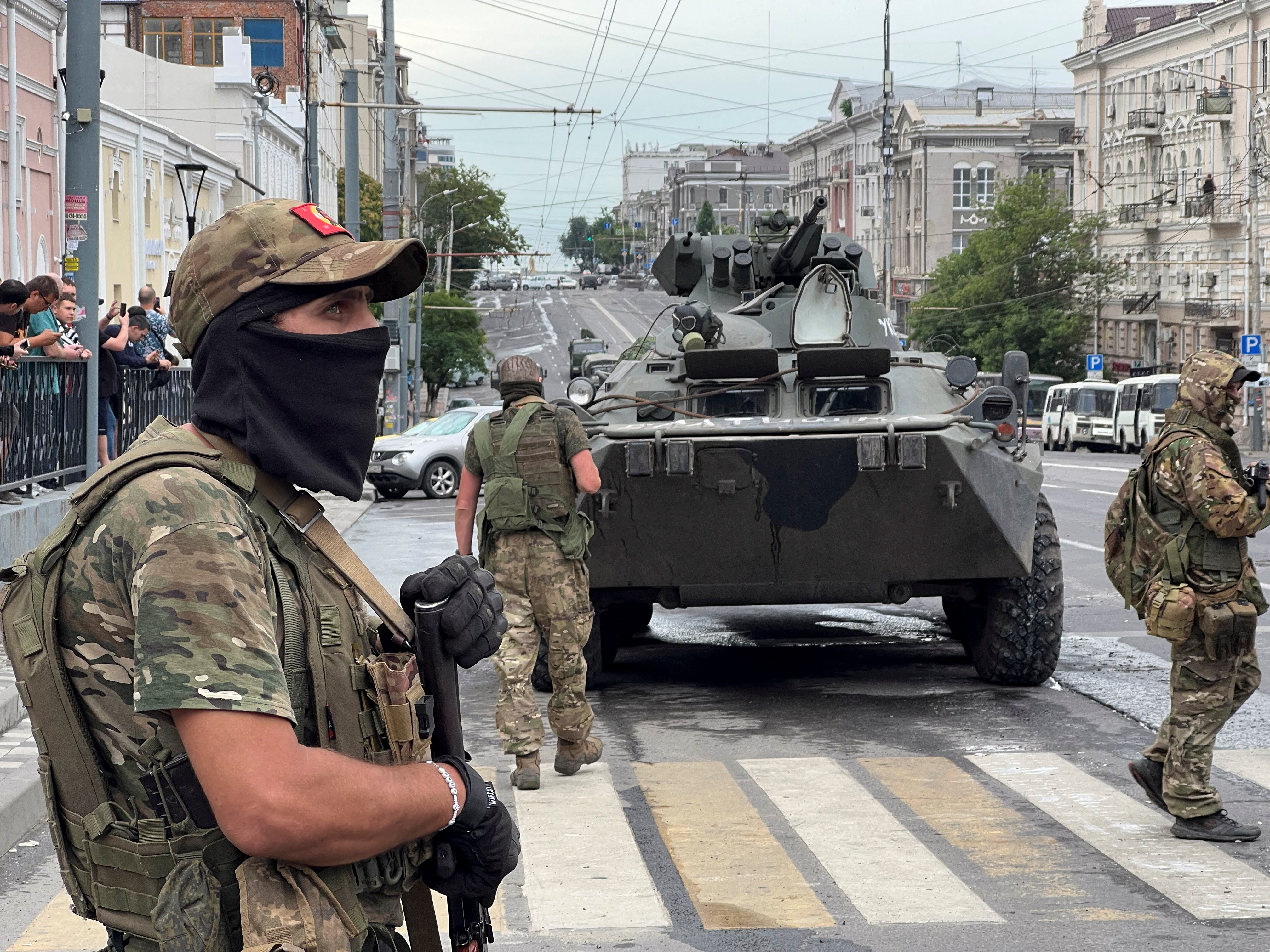 Fighters of Wagner private mercenary group stand guard in a street near the headquarters of the Southern Military District in the city of Rostov-on-Don, Russia, June 24, 2023