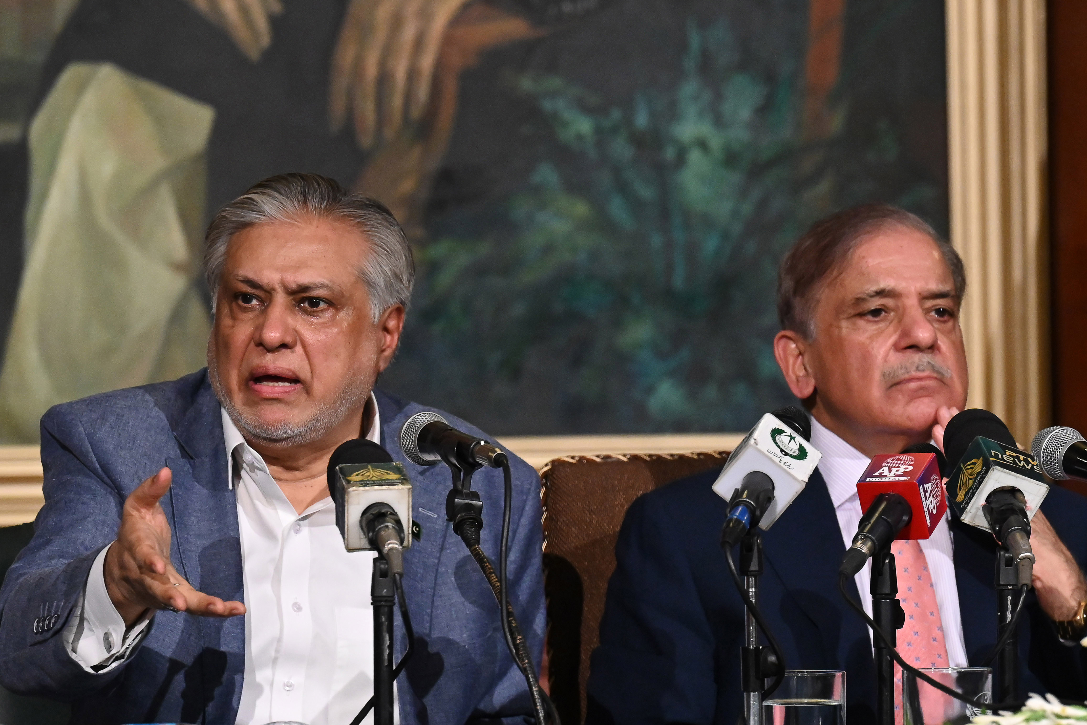 Pakistan's Prime Minister Shehbaz Sharif and Pakistan's Finance Minister Ishaq Dar