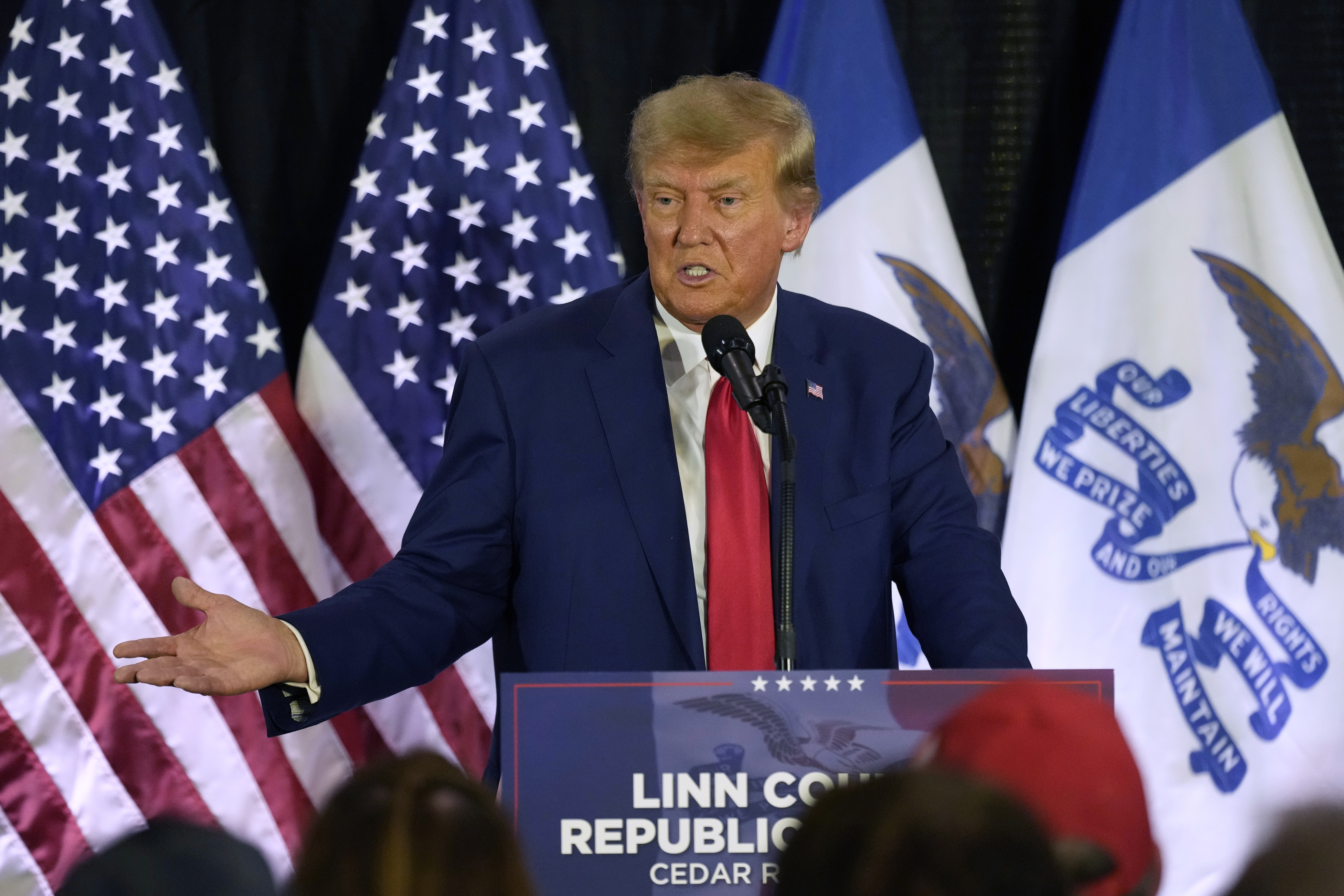 Former US President Donald Trump speaks to campaign volunteers at the Elks Lodge, July 18, 2023, in Cedar Rapids, Iowa. A target letter sent to Donald Trump suggests that a sprawling Justice Department investigation into efforts to overturn the 2020 elections is zeroing in on him [Charlie Neibergall/AP Photo/File]