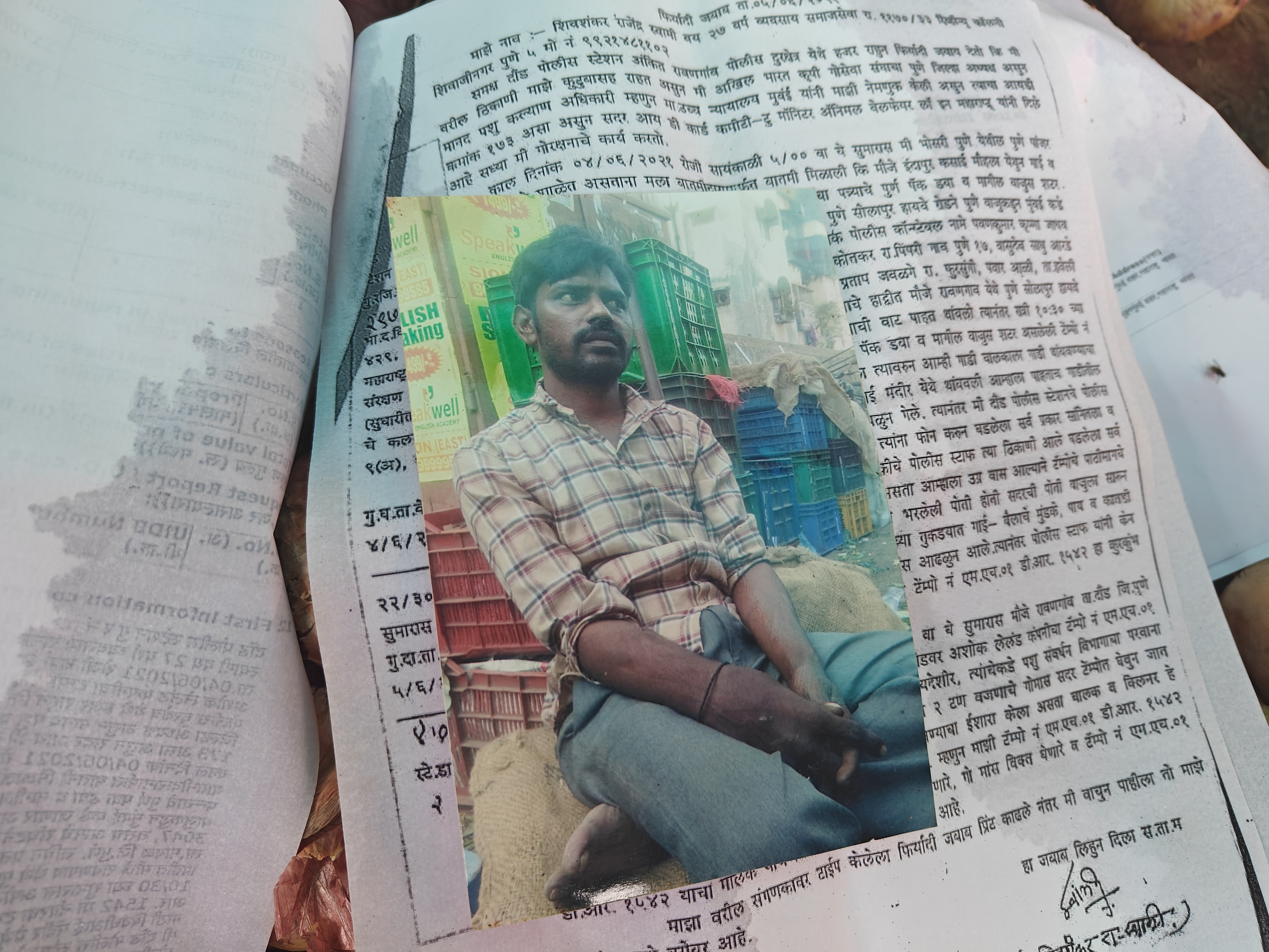 Rafiq's picture that his wife Reshma still carries with her in her purse [Parth MN/Al Jazeera]