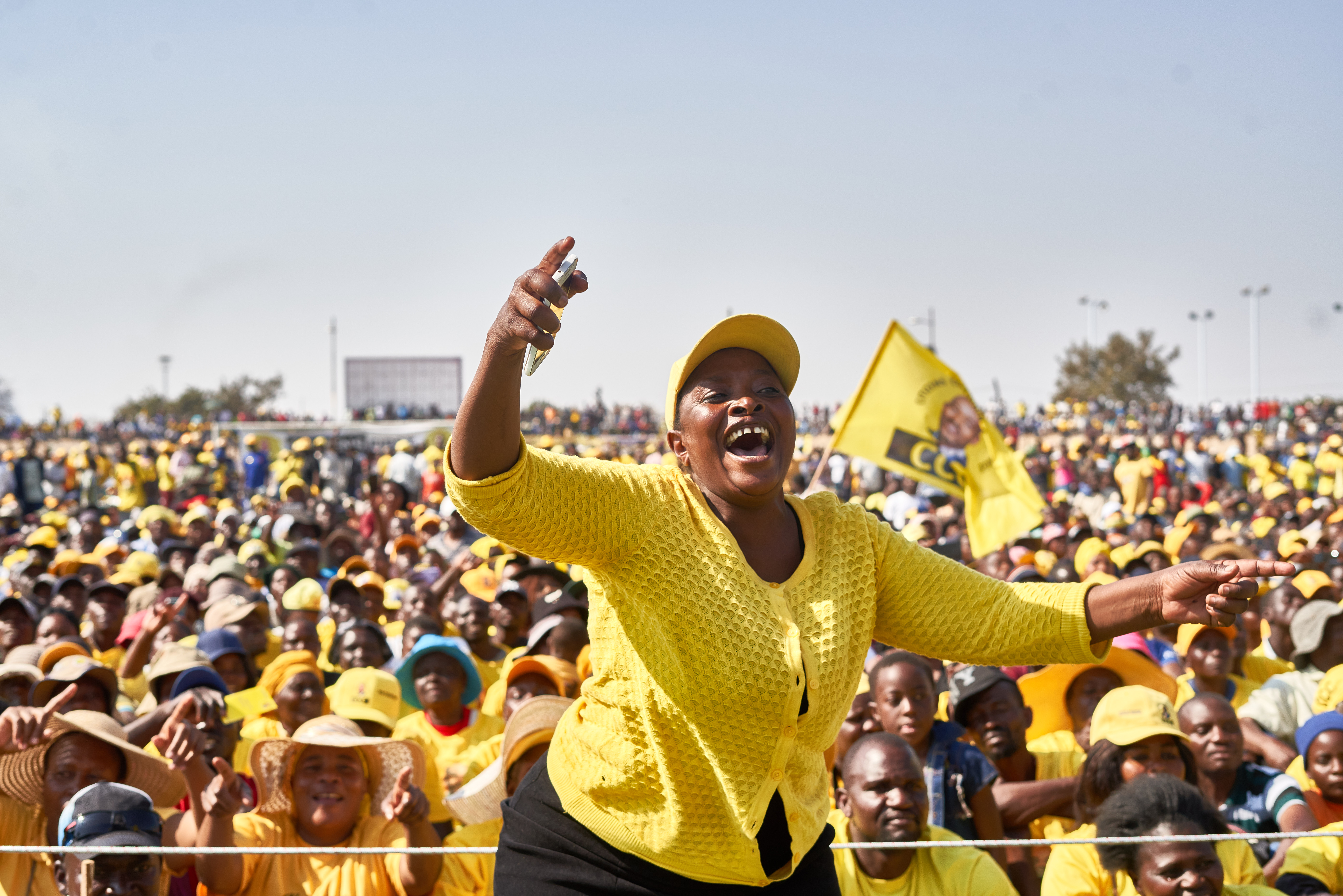 A supporter of Zimbabwe's main opposition party, Citizen’s Coalition for Change (CCC), raises her finger, the party symbol, at a rally addressed by presidential hopeful Nelson Chamisa, at White City Stadium in Bulawayo, Zimbabwe on August 19, 2023 [
