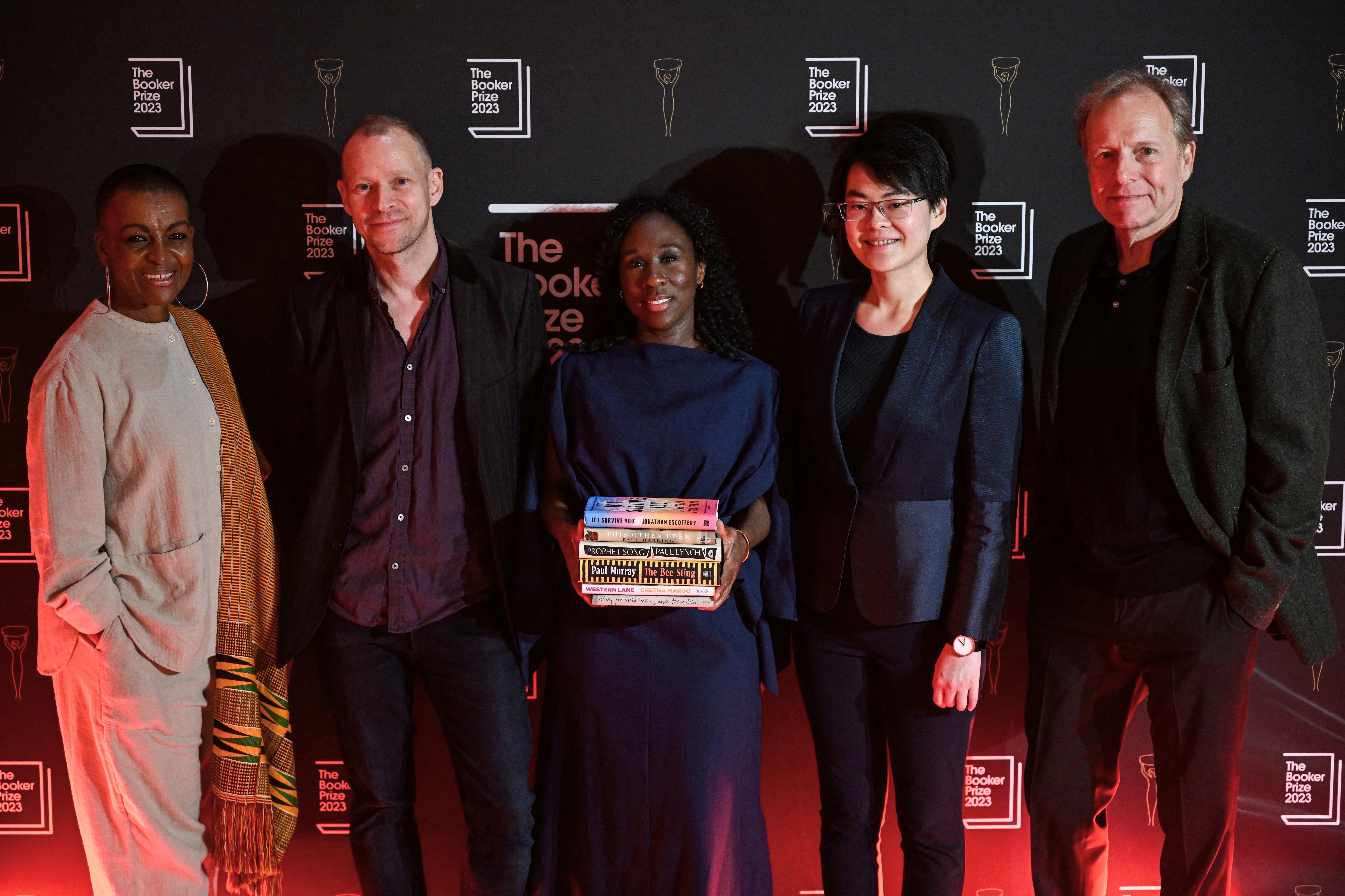 Judges for the award (from L) British actress Adjoa Andoh, British actor and author Robert Webb, Canadian author Esi Edugyan, Hong Kong poet Mary Jean Chan and US Professor at Columbia University and authors James Shapiro pose during the photo call for the authors shortlisted for the Booker Prize 2023 for Fiction at the National Portrait Gallery, in London, on September 21, 2023. (Photo by JUSTIN TALLIS / AFP)