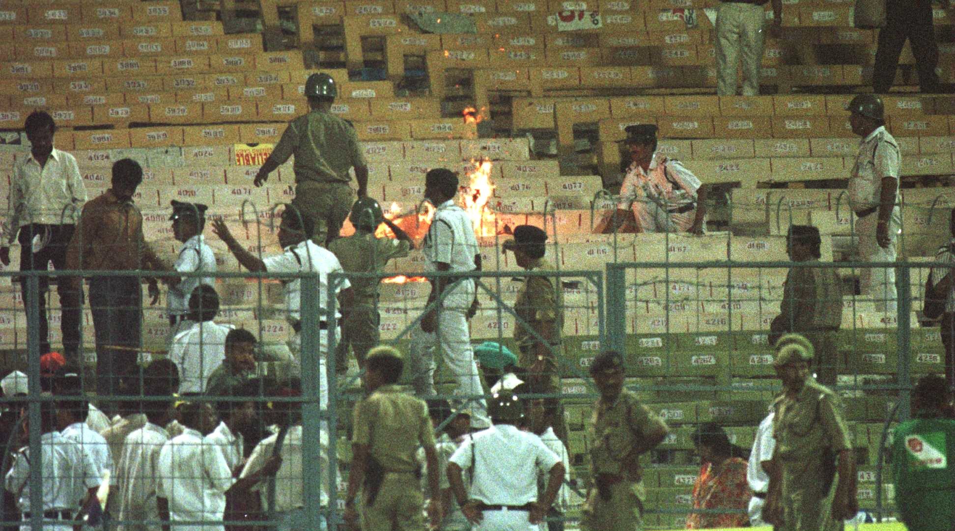 Fires burn in the stands during the semi-final in the Cricket World Cup between India and Sri Lanka played at Eden Gardens in Calcutta.