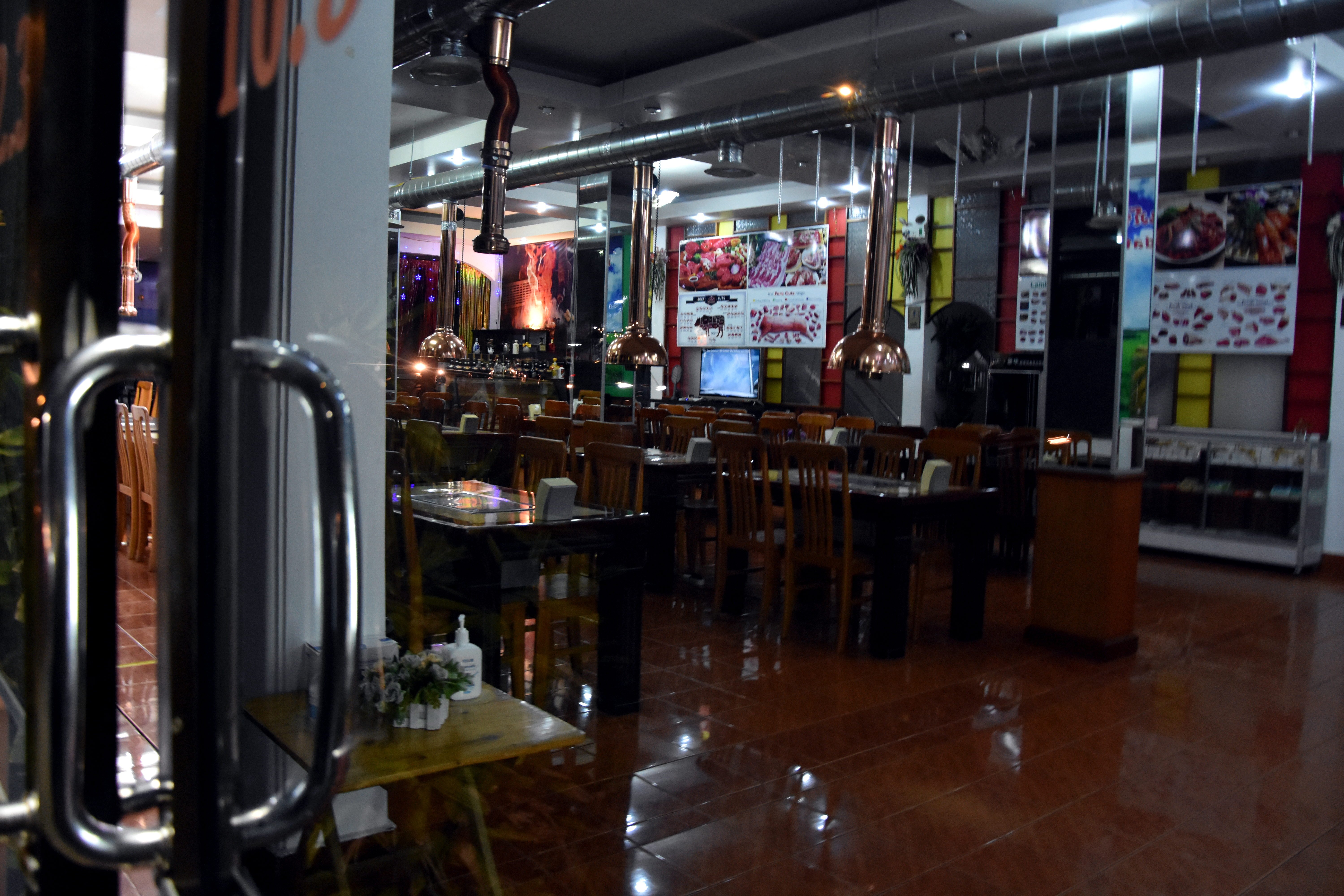 a close up of the emptry tables and chairs at the Pyongyang restaurant