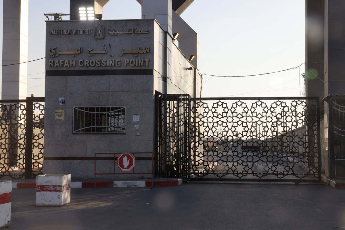 A picture taken on October 10, 2023, shows the closed gates of the Rafah border crossing with Egypt