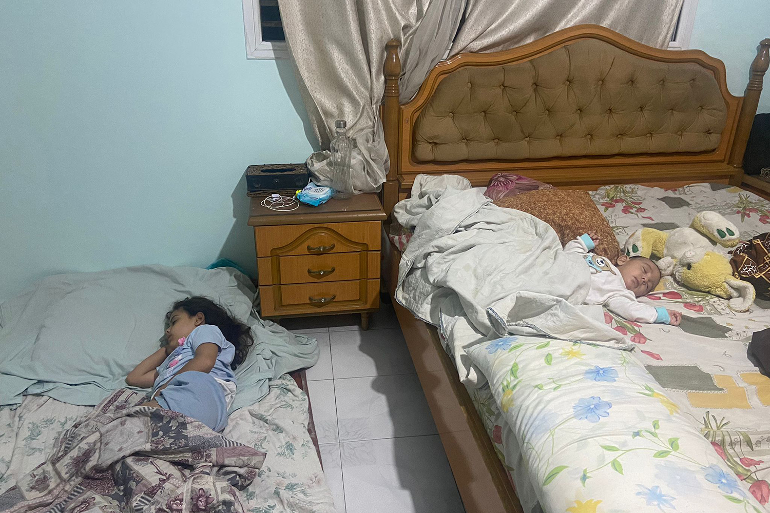 We set up the mattresses on the floor, making sure to drag them well away from the windows