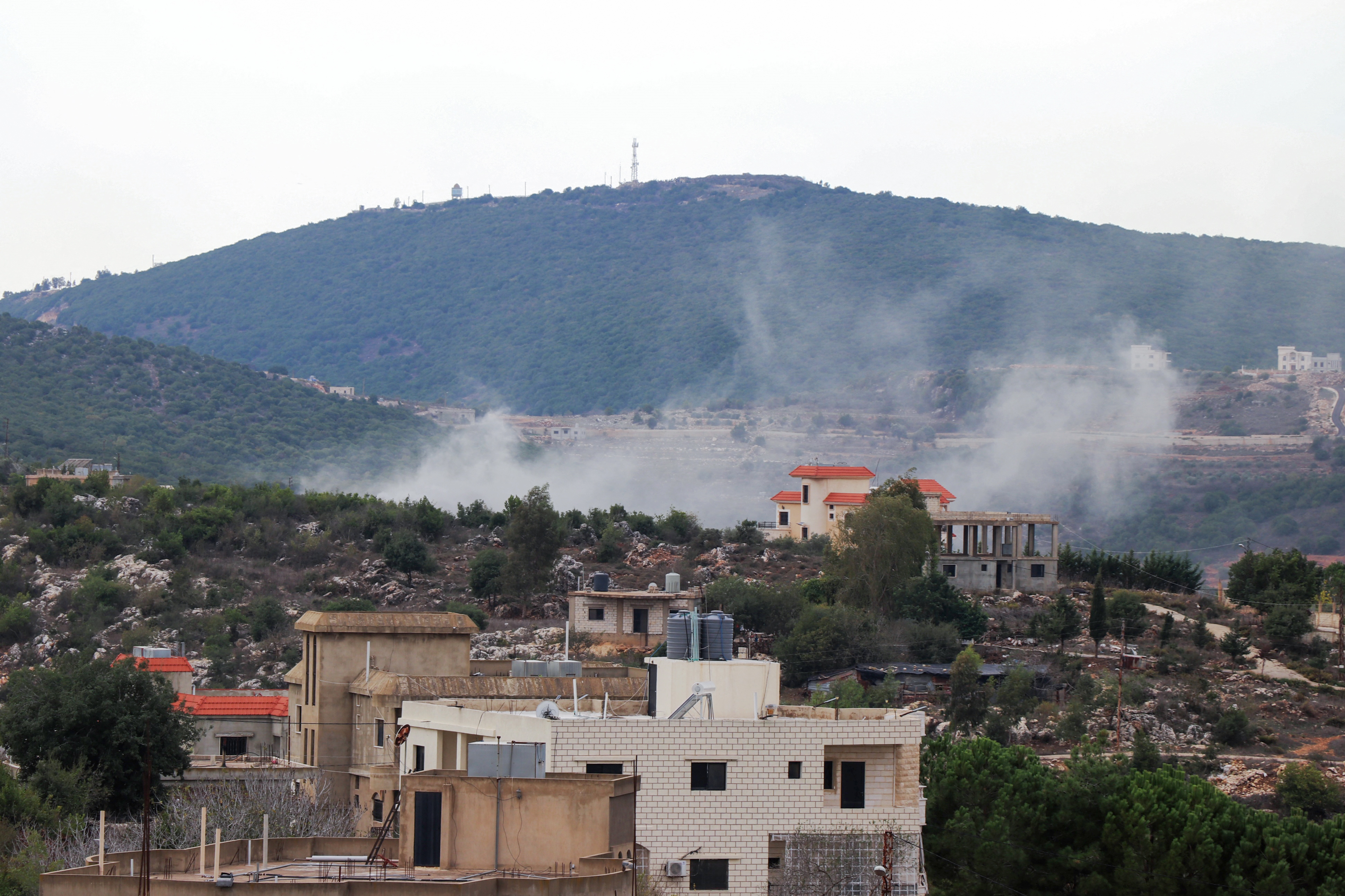 Smoke rises following Israeli artilley shelling on the village of Beit Lif, along Lebanon&#039;s southern border with northern Israel on November 13, 2023 [AFP]