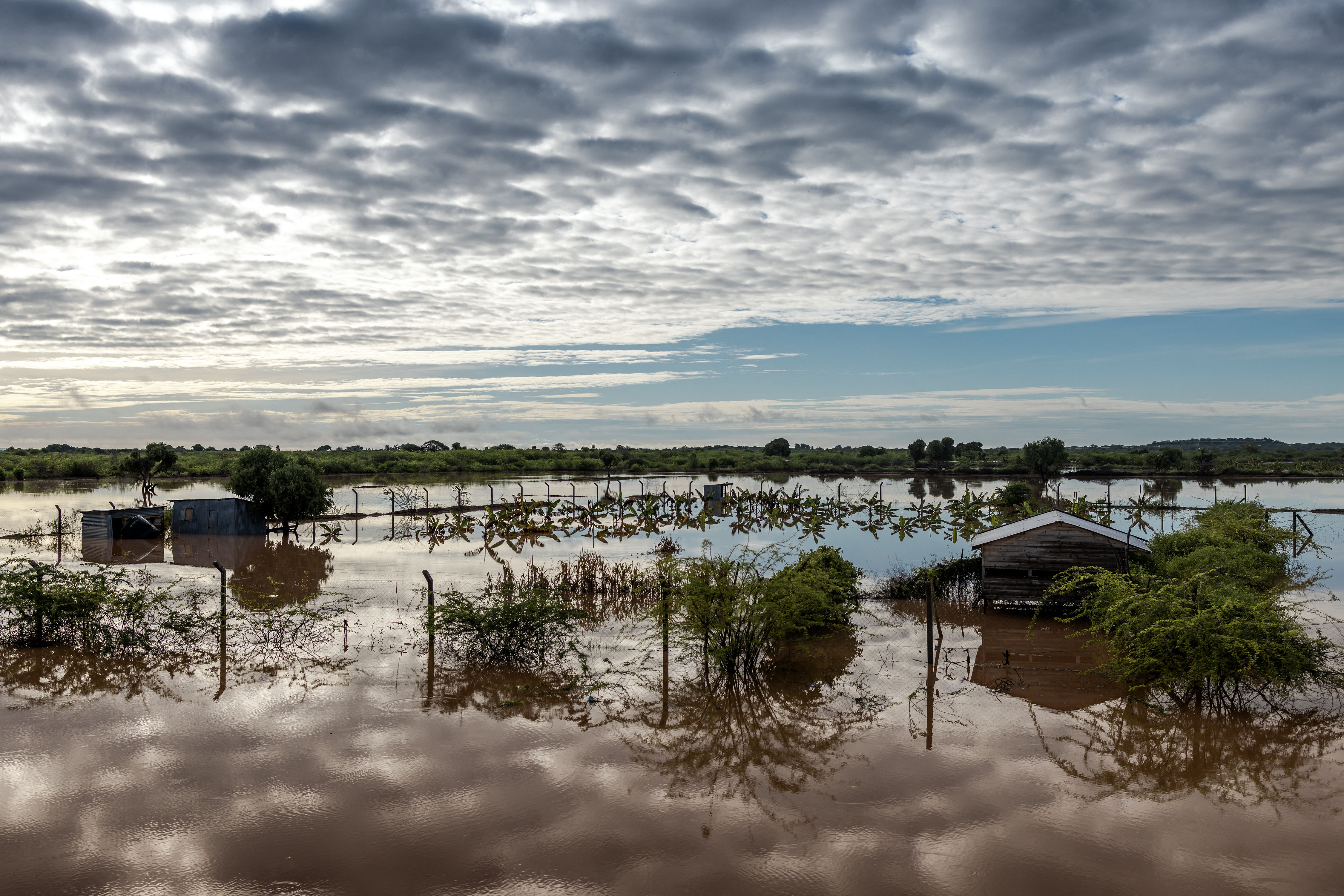 Farmland and houses are covered on water in an inundated area following flash floods in Garissa.