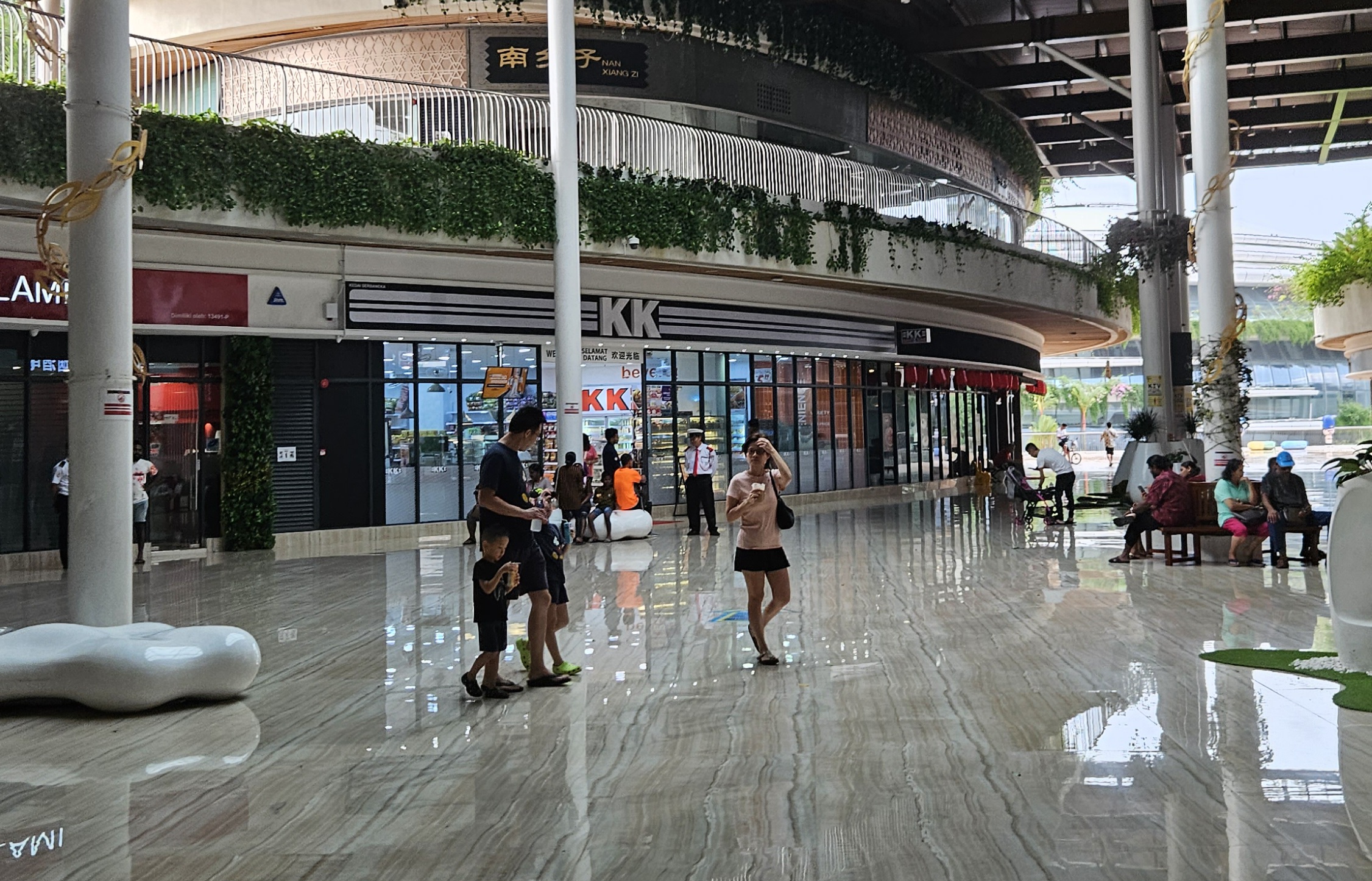A shopping area of Forest City. There are not many people even though it is a public holiday.