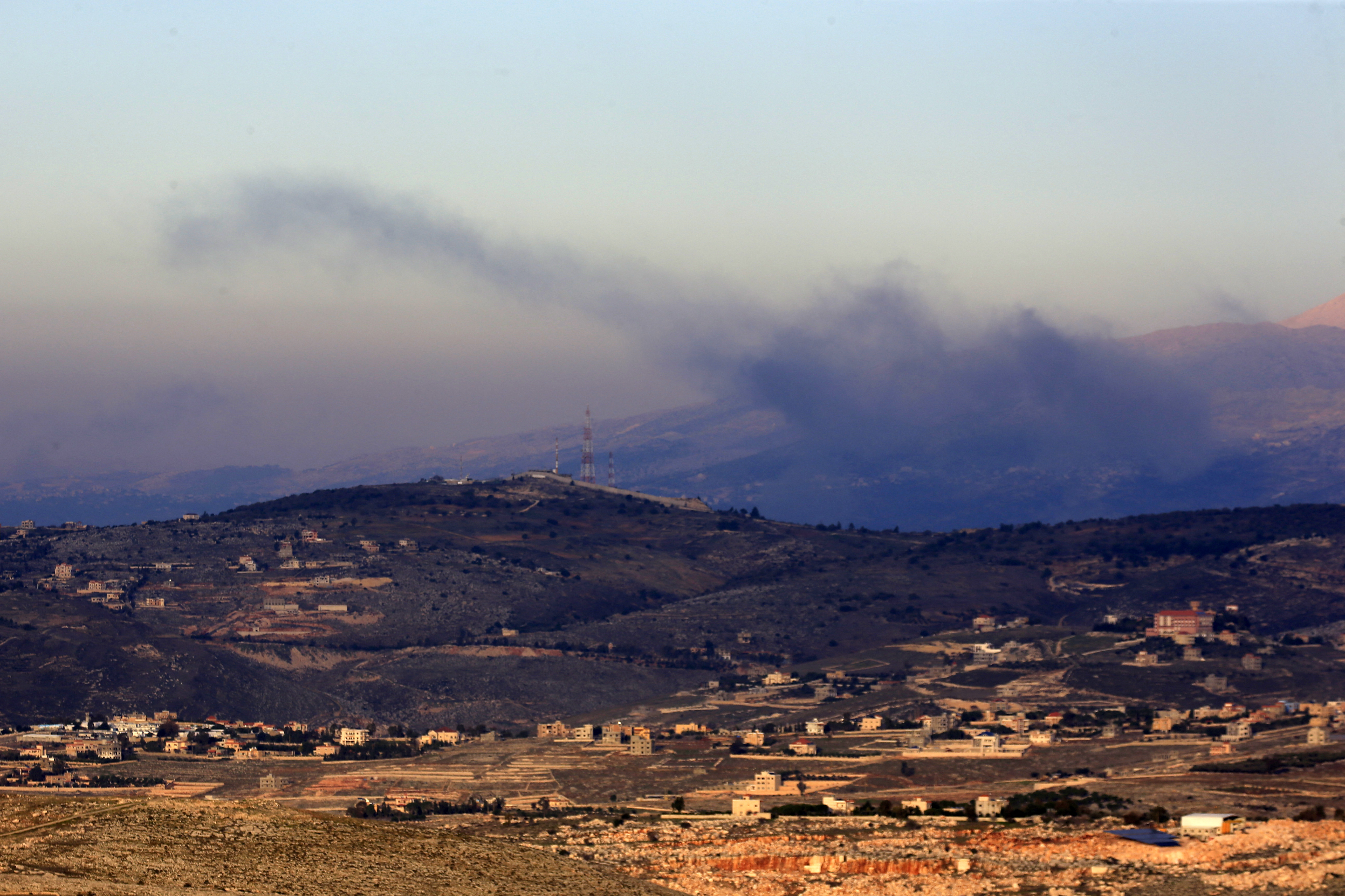 Smoke billows on the outskirts of the village of Kfarshuba, along Lebanon's southern border with northern Israel following Israeli bombardment.