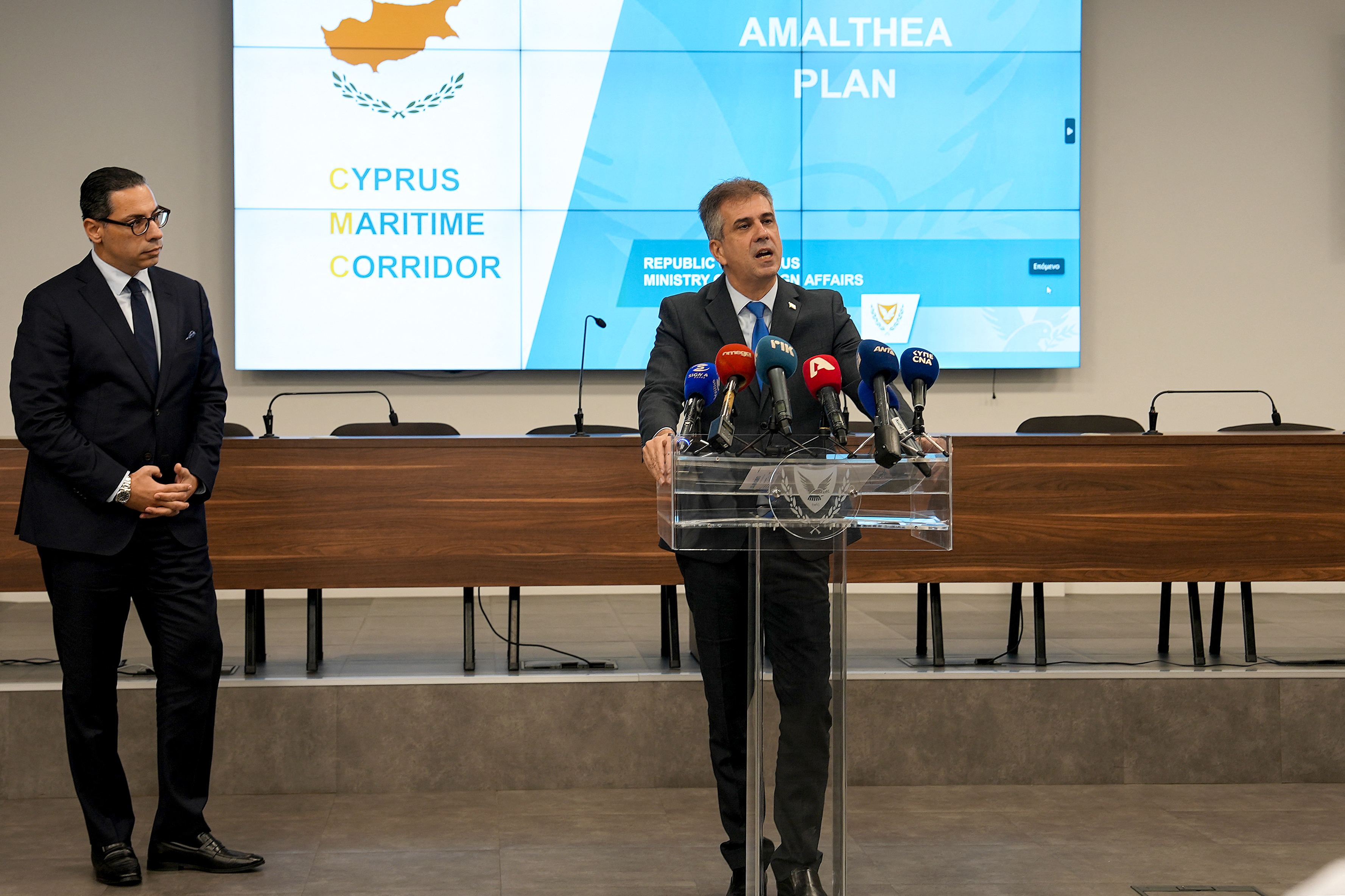Israel's Foreign Minister Eli Cohen and his Cypriot counterpart Constantinos Kombos give a press conference in Nicosia on December 20, 2023 talking about a humanitarian aid corridor from the Mediterranean island to war-torn Gaza.
