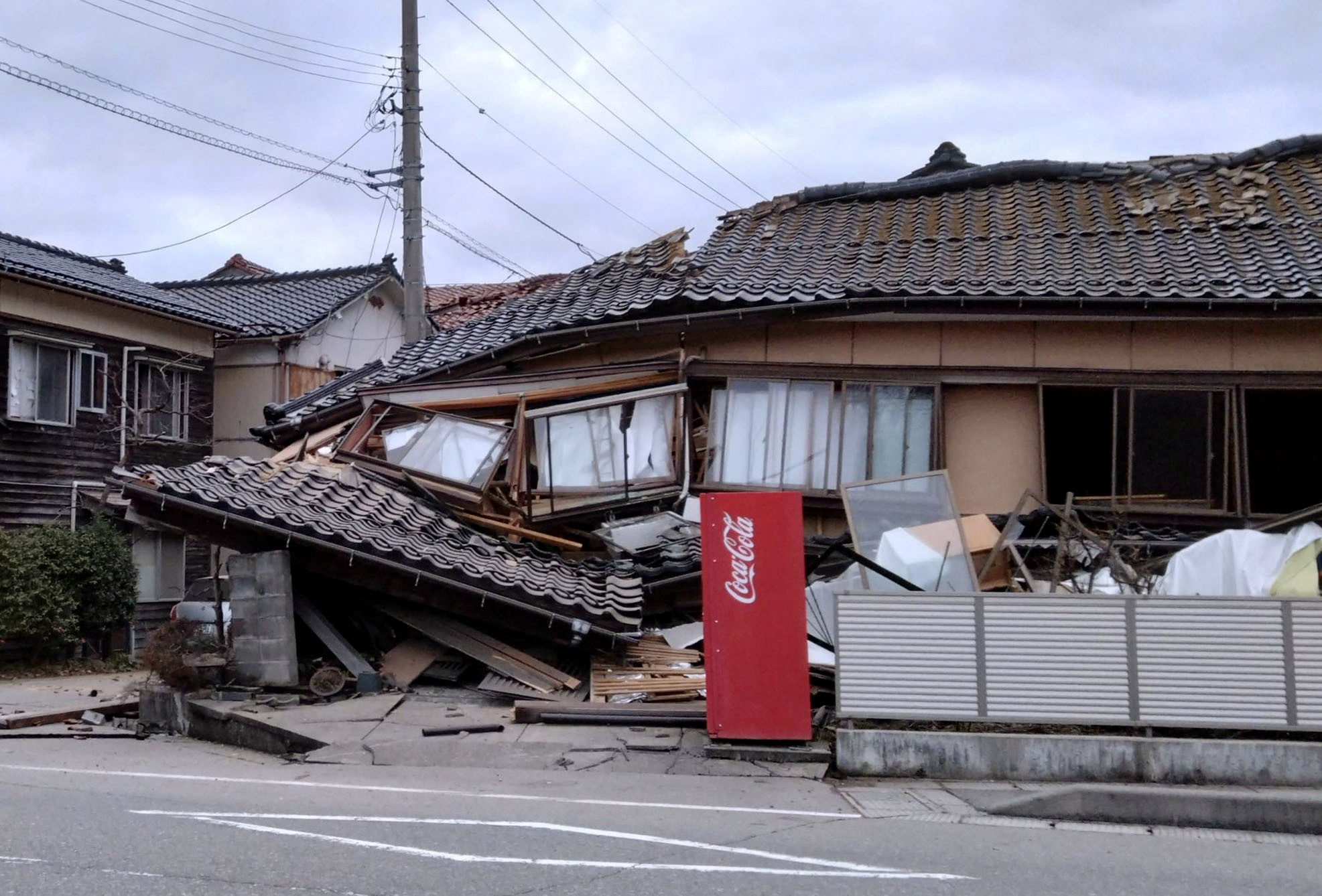 A collapsed house following an earthquake is seen in Wajima, Ishikawa prefecture, Japan January 1, 2024, in this photo released by Kyodo. Mandatory credit Kyodo via REUTERS ATTENTION EDITORS - THIS IMAGE WAS PROVIDED BY A THIRD PARTY. MANDATORY CREDIT. JAPAN OUT. NO COMMERCIAL OR EDITORIAL SALES IN JAPAN