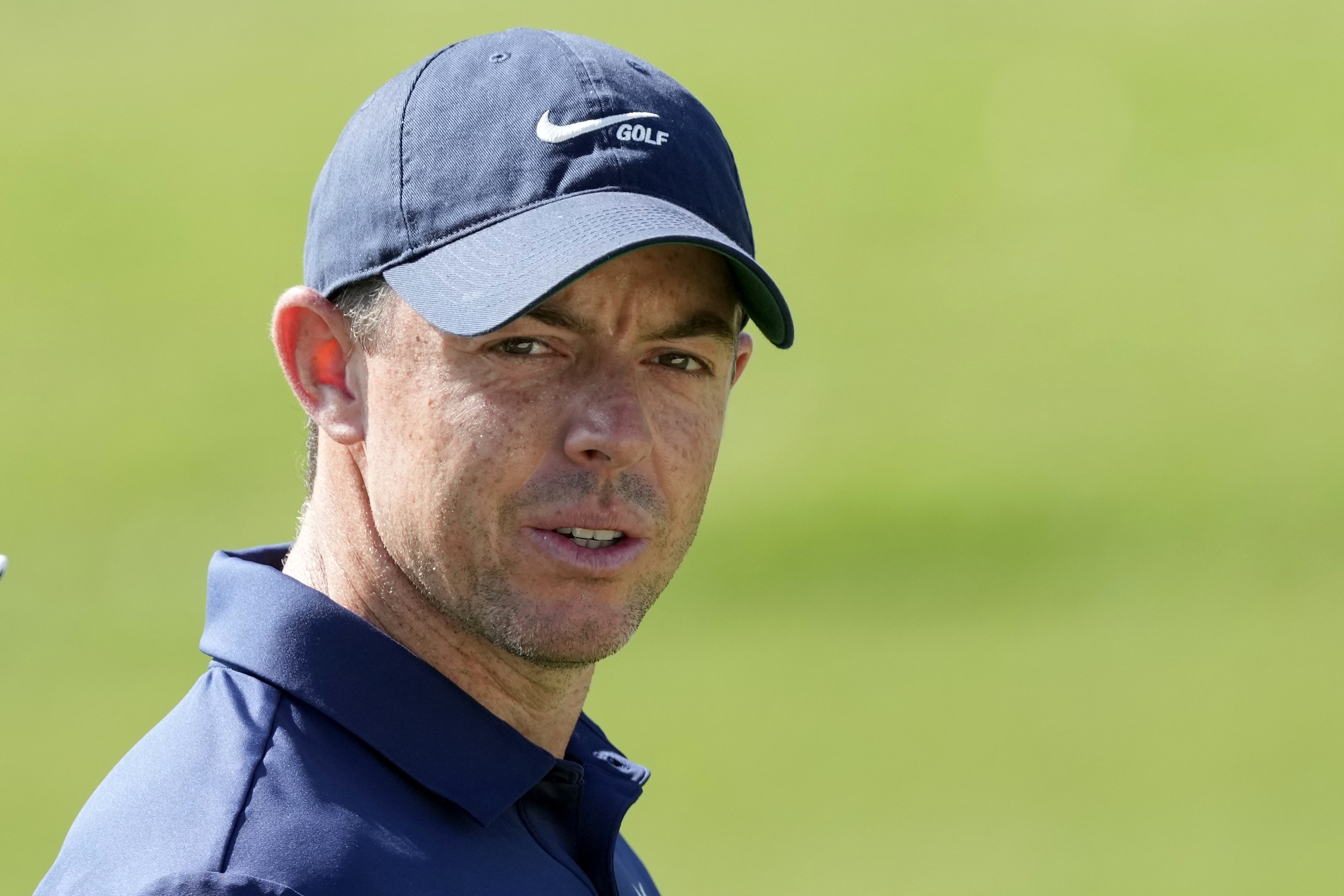 Rory McIlroy of Northern Ireland plays his second shot on the 3rd hole during the round two of the DP World Tour Championship golf tournament, in Dubai, United Arab Emirates, Friday, Nov. 17, 2023. (AP Photo/Kamran Jebreili)