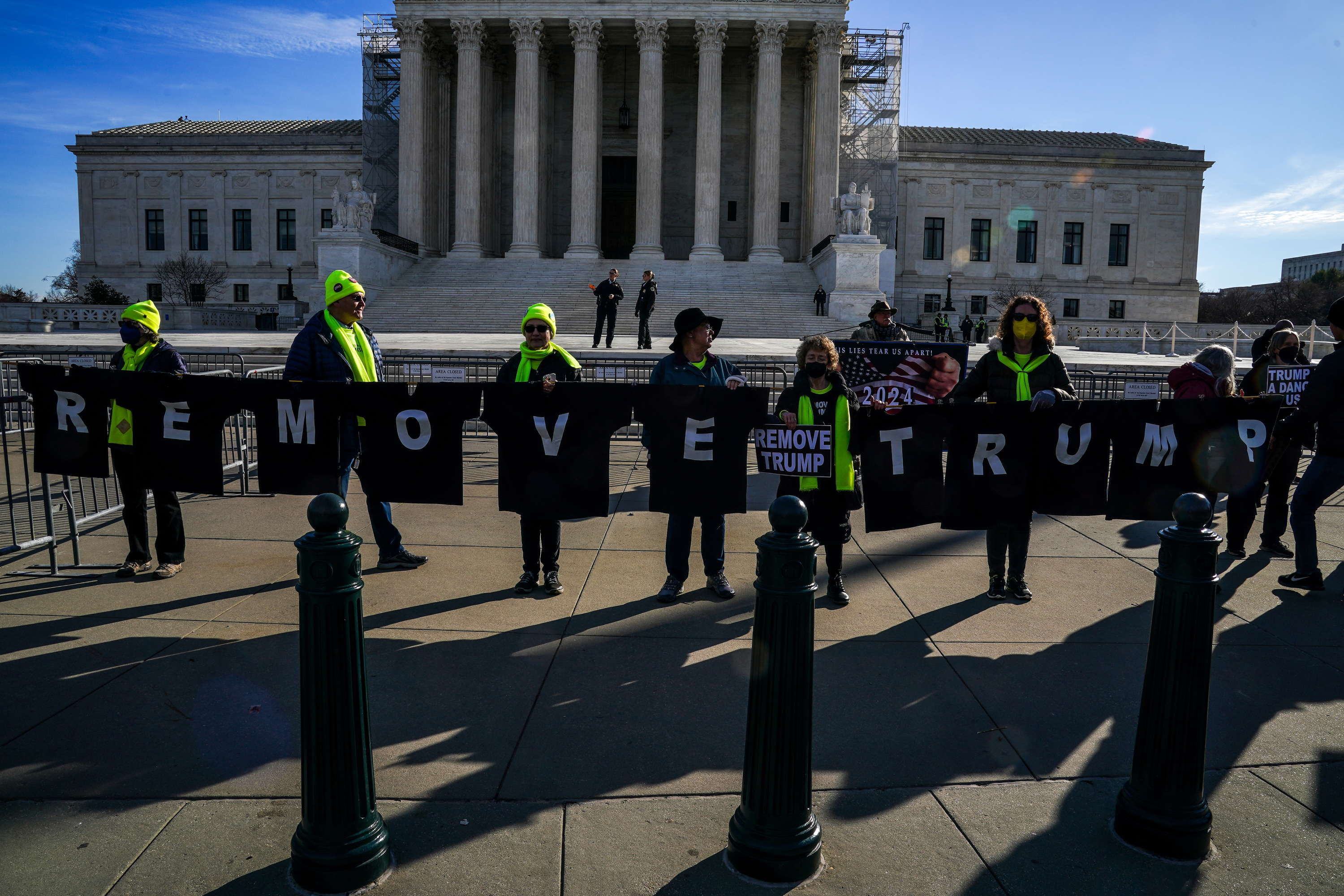 Demonstrators call for Donald Trump to be kept out of the president&#039;s office outside the United States Supreme Court on February 8, 2024 [Jahi Chikwendiu/The Washington Post via Getty Images]