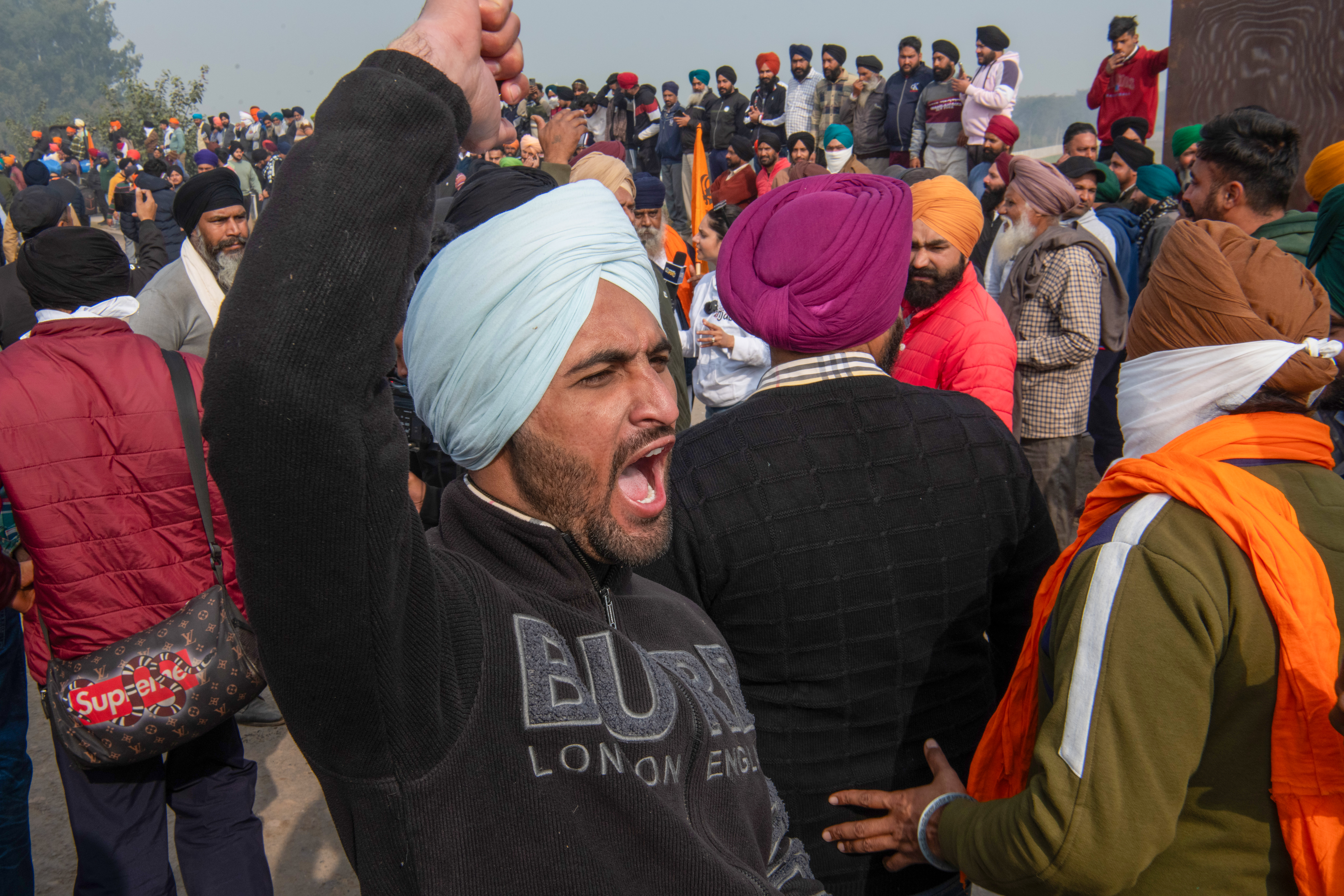 A farmer shouts slogans after authorities stop protesting farmers from moving towards Delhi at Shambhu border near Haryana. The farmers clash with the police at Shambhu border to continue their protest towards New Delhi.