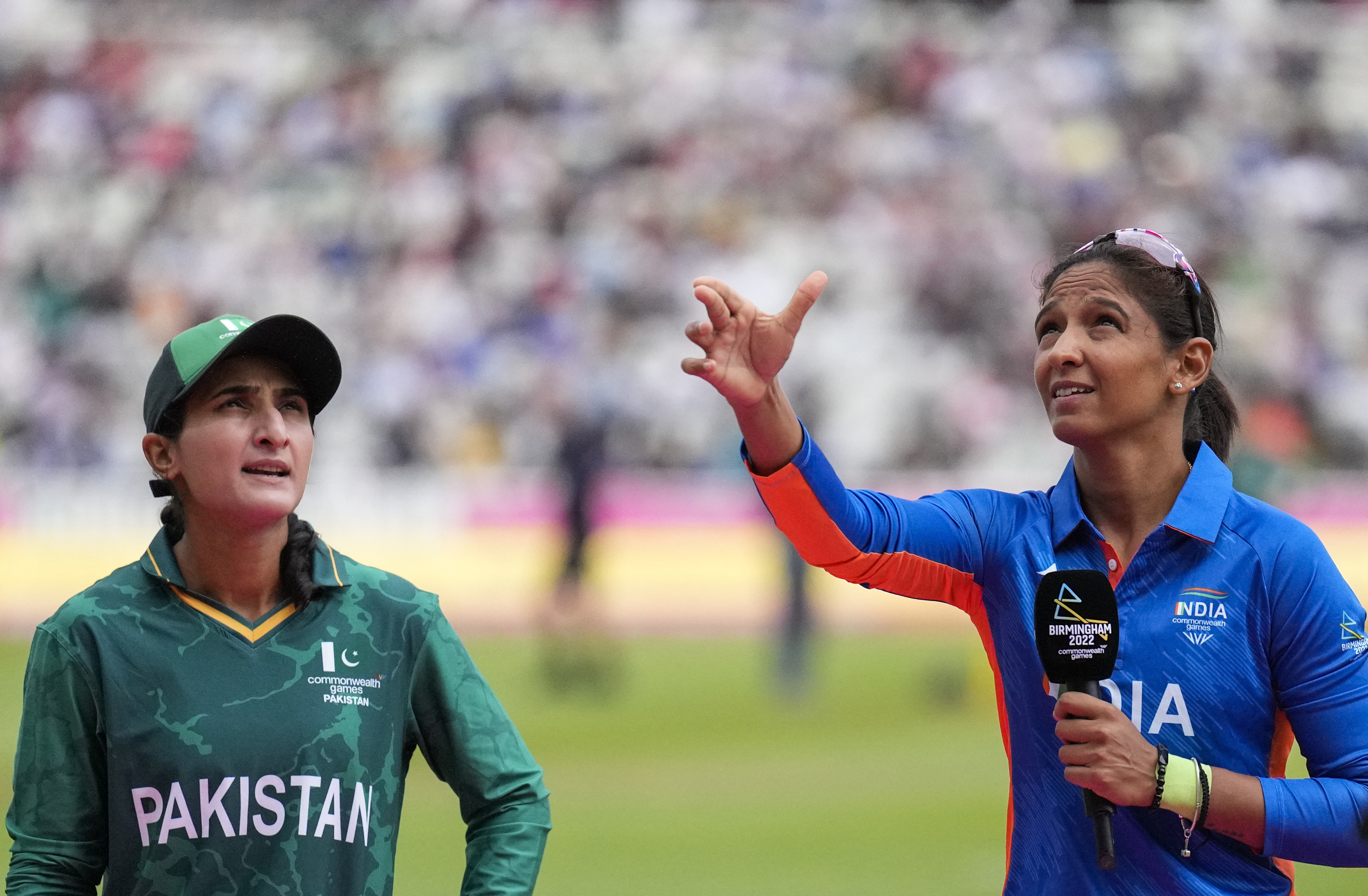 Pakistan's captain Bismah Maroof, left watches India's captain Harmanpreet Kaur