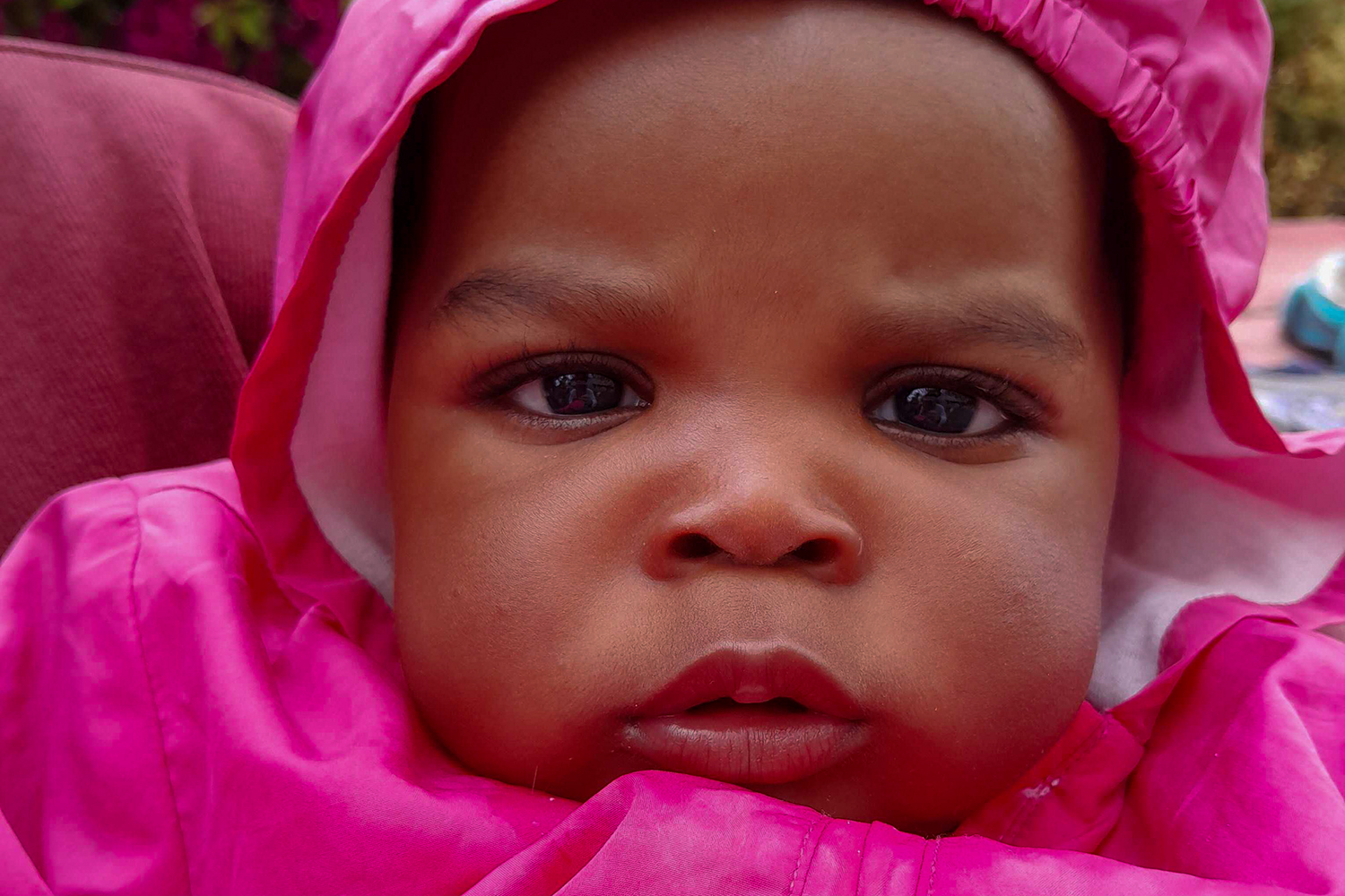Four month old Nigerian, Freedom, featured outside the IOM offices on 02 May