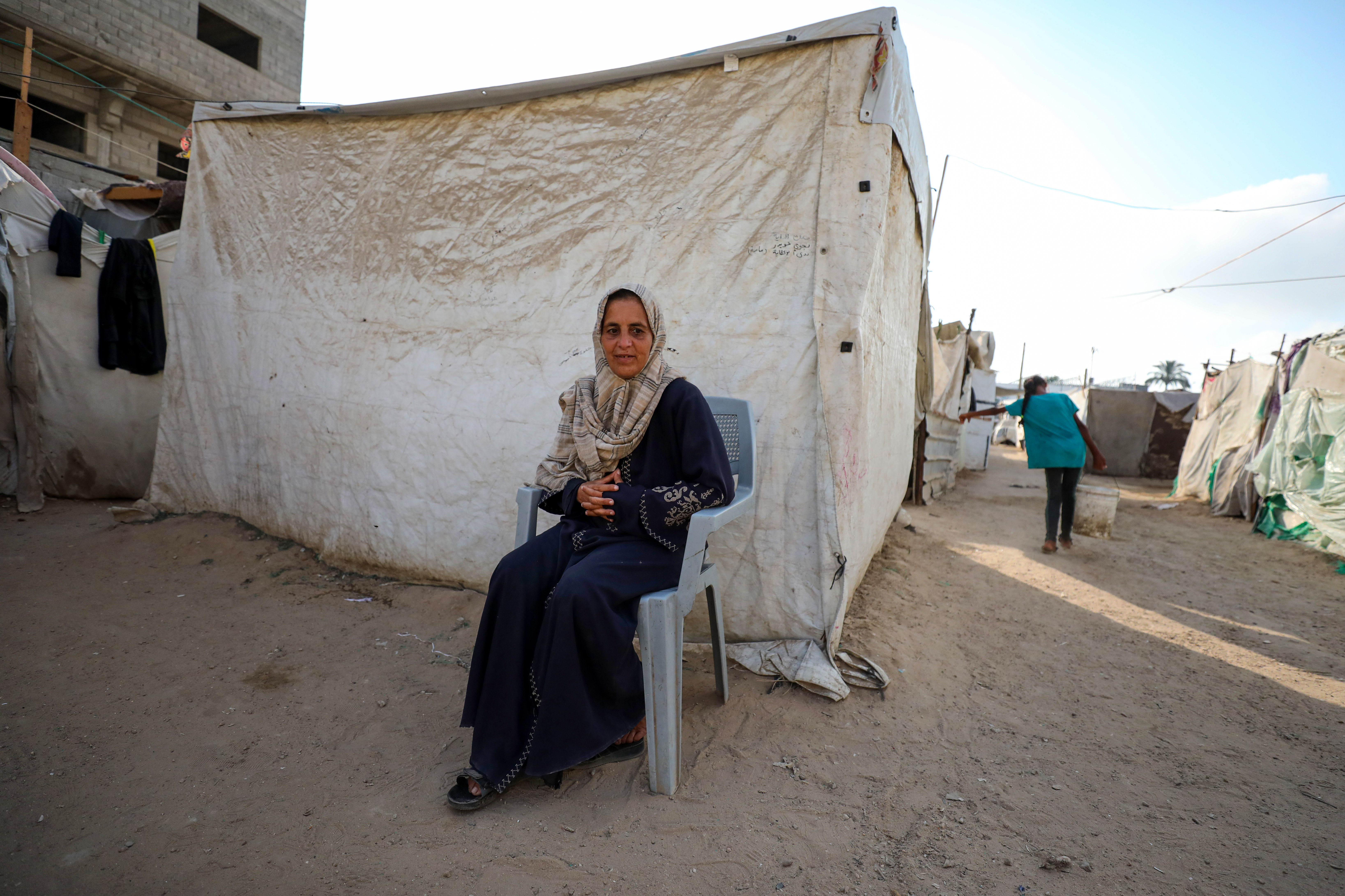 Asmaa Nimilaat, 50, fears that no future US president will support Palestinians [Atia Darwish/Al Jazeera]