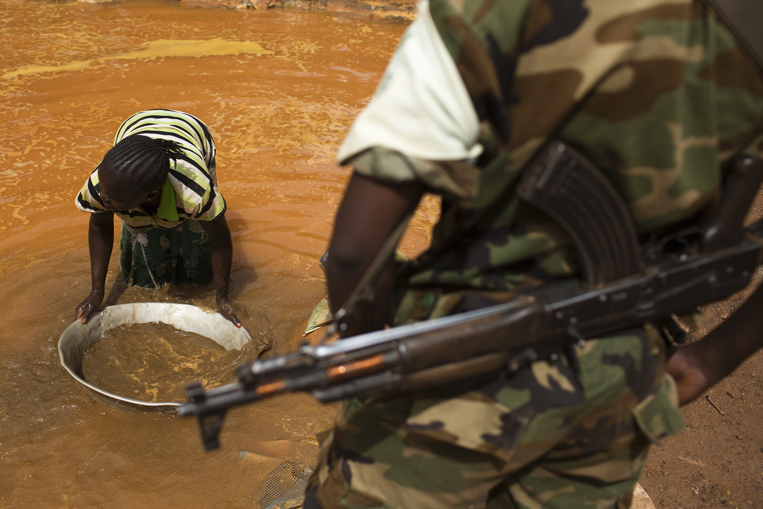 A soldier and a gold miner in CAR