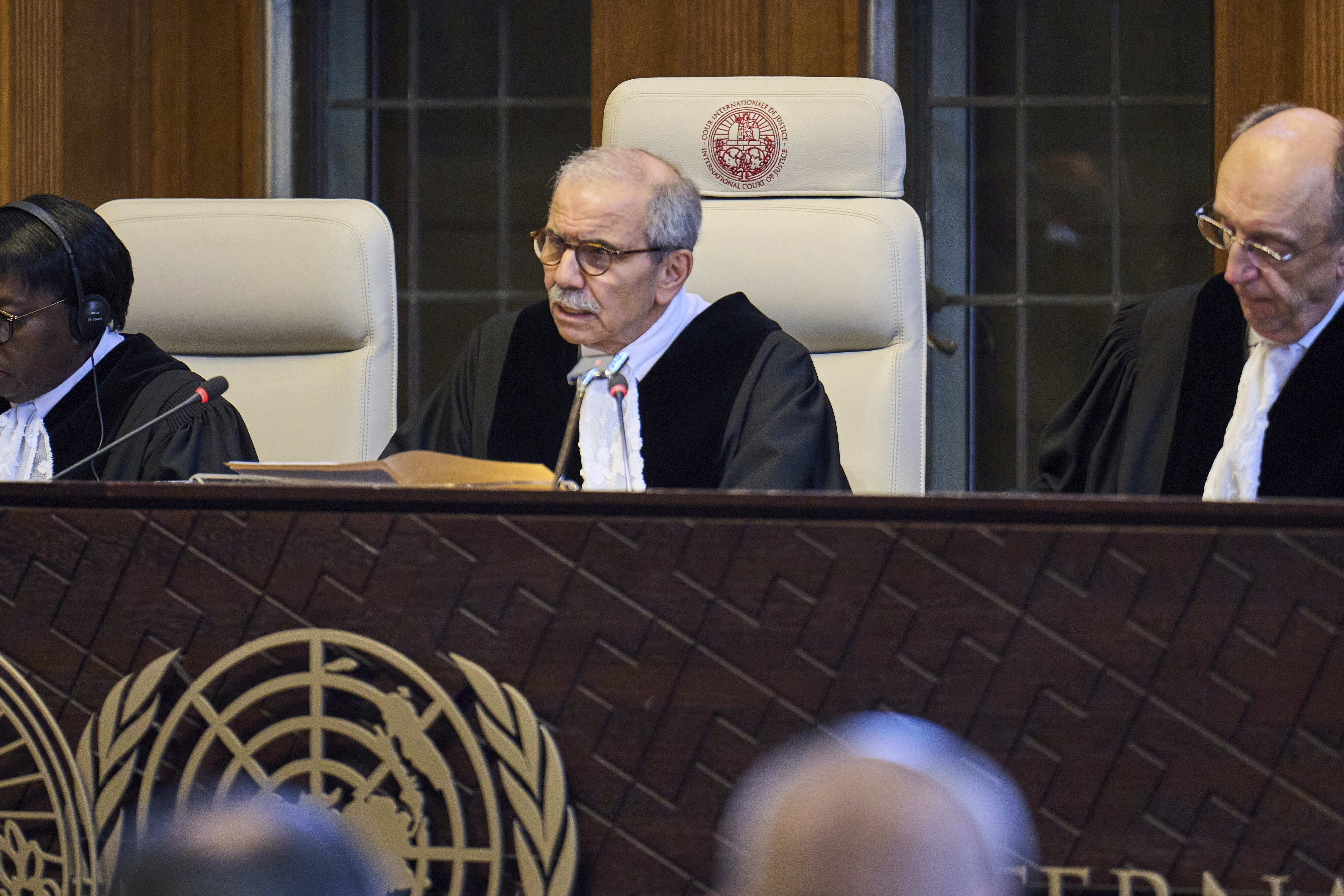 Judge Nawaf Salam, president of the International Court of Justice, or World Court, read out the non-binding advisory opinion issued by the 15-judge panel on Israel&rsquo;s occupation of Palestinian territory, in The Hague, Netherlands, Friday, July 19, 2024 [Phil Nijhuis/AP Photo]
