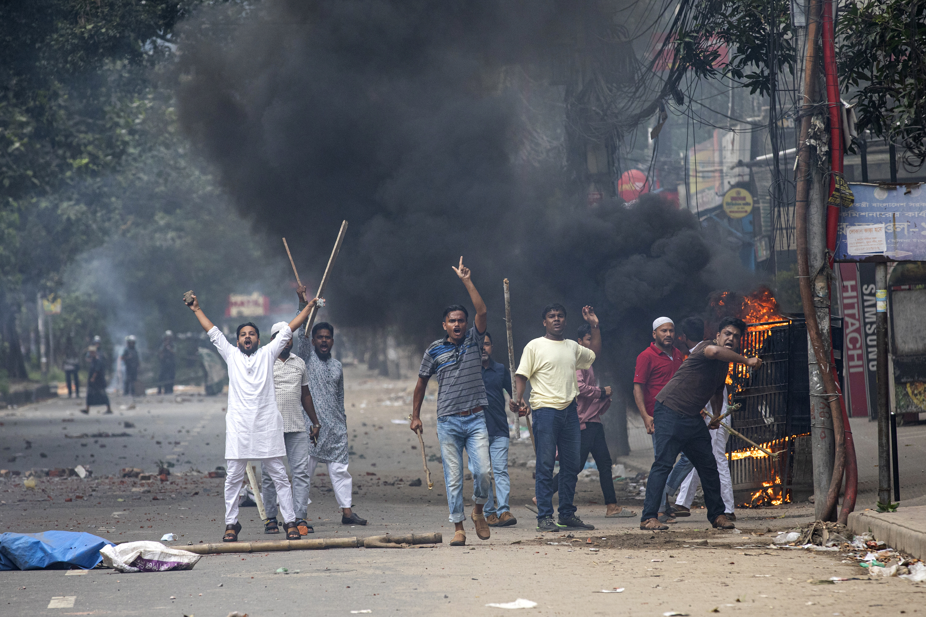 Students clash with police during a protest over a controversial quota system for government job applicants, in Dhaka, Bangladesh on Friday, July 19, 2024 [Rajib Dhar/AP Photo]