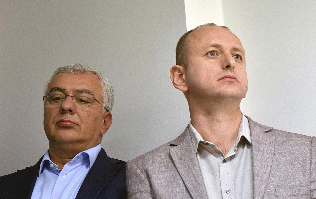 Montenegro parliament speaker Andrija Mandic, left, and lawmaker Milan Knezevic