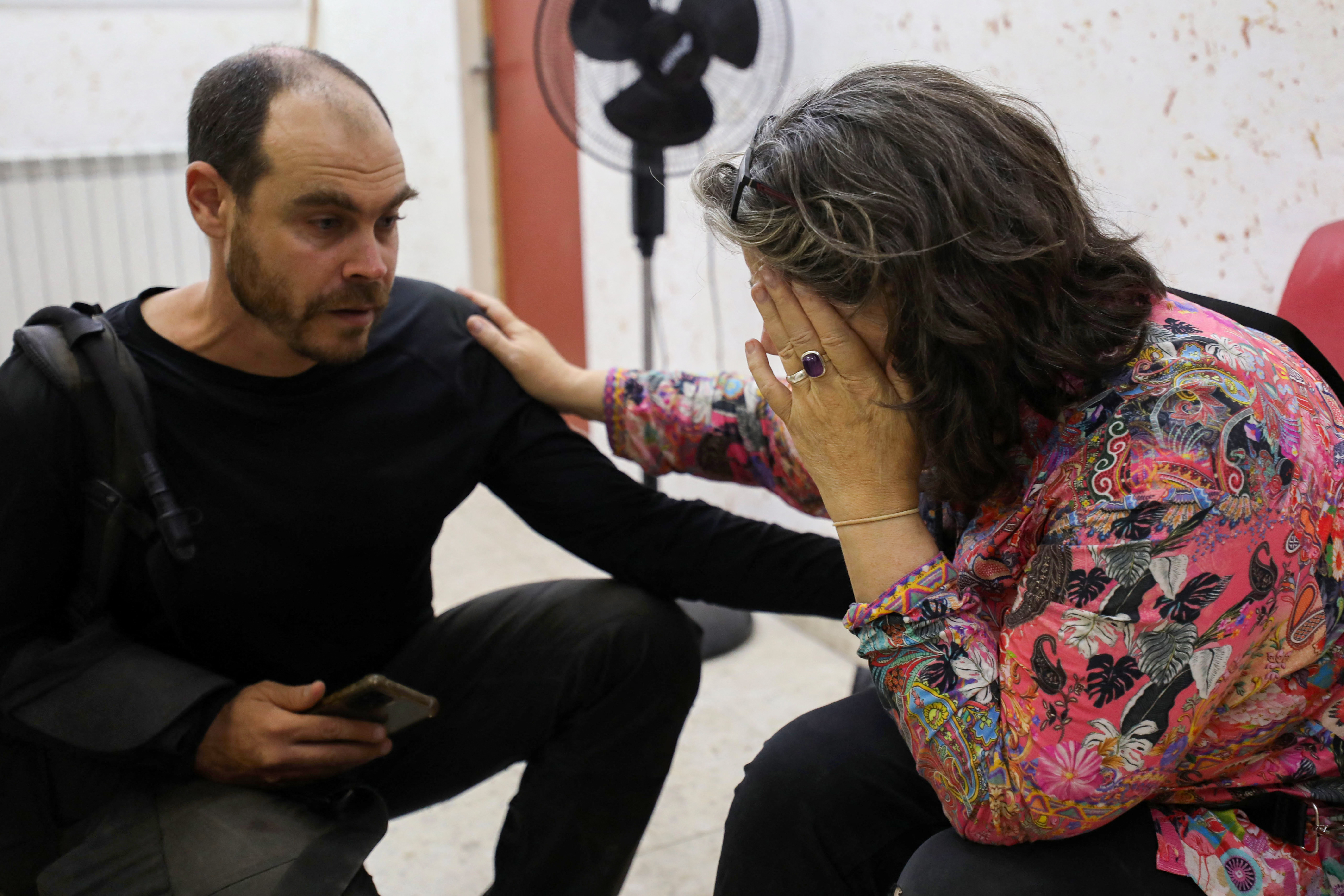 Colleagues of Aysenur Ezgi Eygi, US-Turkish activist who died after reportedly being shot in the West Bank town of Beita, react on news of her death in a hospital in Nablus in the occupied West Bank on September 6, 2024. - A US-Turkish citizen was shot dead on September 6 while demonstrating against Israeli settlements in the occupied West Bank town of Beita, where the army acknowledged opening fire. (Photo by AFP)