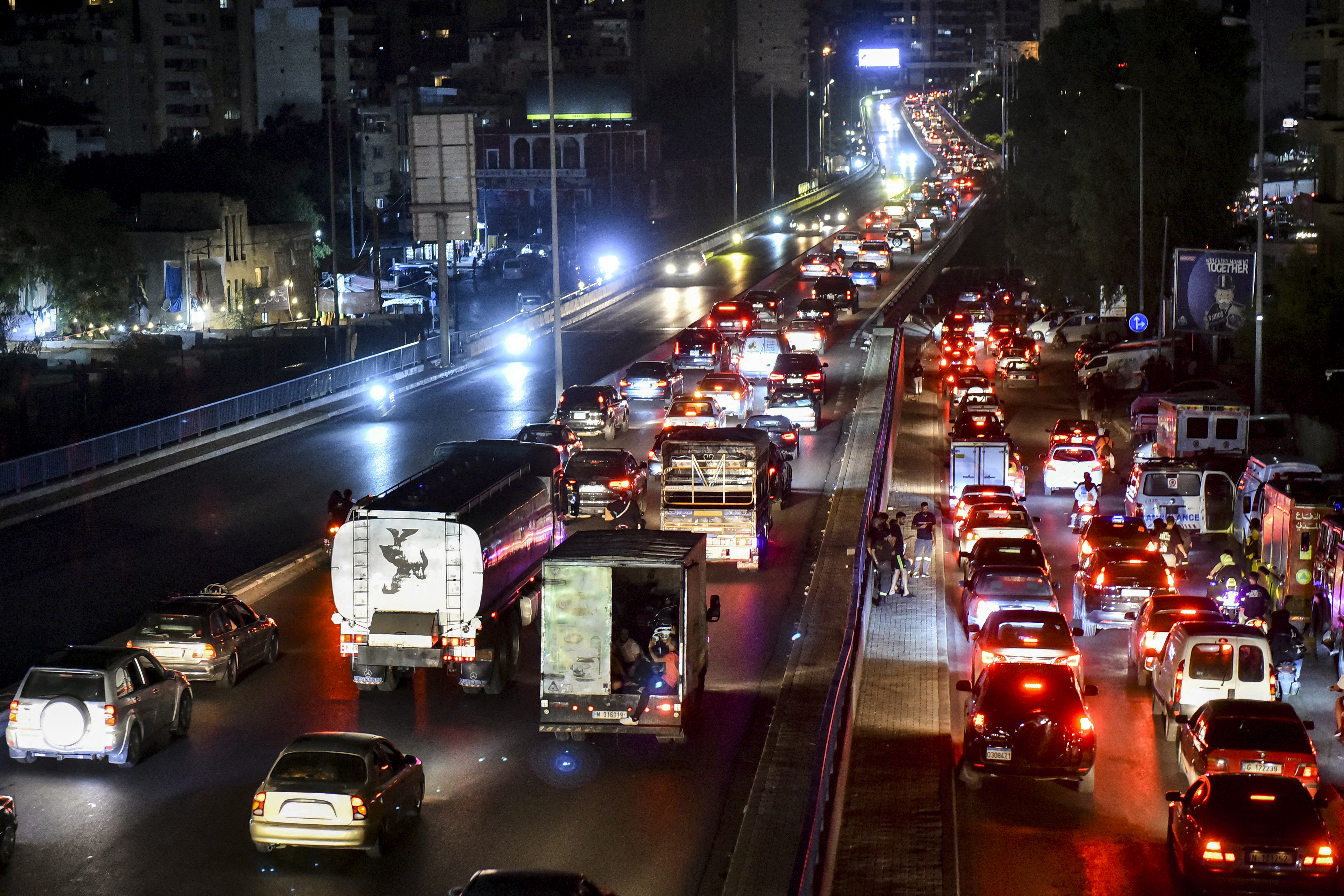 Vehicles move along a congested highway along the southern entry to Beirut on September 23, 2024. - Israeli air strikes killed at least 356 people, including 24 children, in Lebanon on September 23, the Lebanese government said, in the deadliest cross-border escalation since the Gaza war erupted in October 2023. Arab states sharply condemned Israel over the sharpest escalation in nearly a year of Israel-Hezbollah hostilities. (Photo by Fadel ITANI / AFP) (AFP)