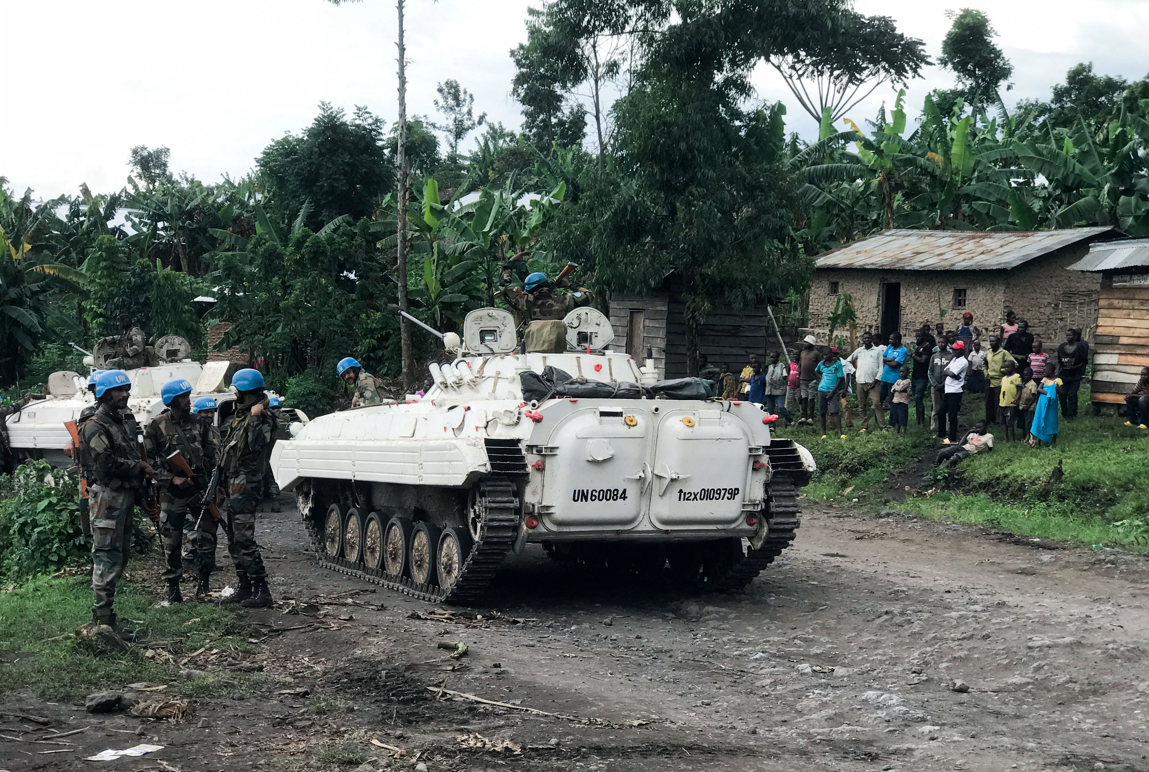 MONUSCO peacekeepers are seen with civilians