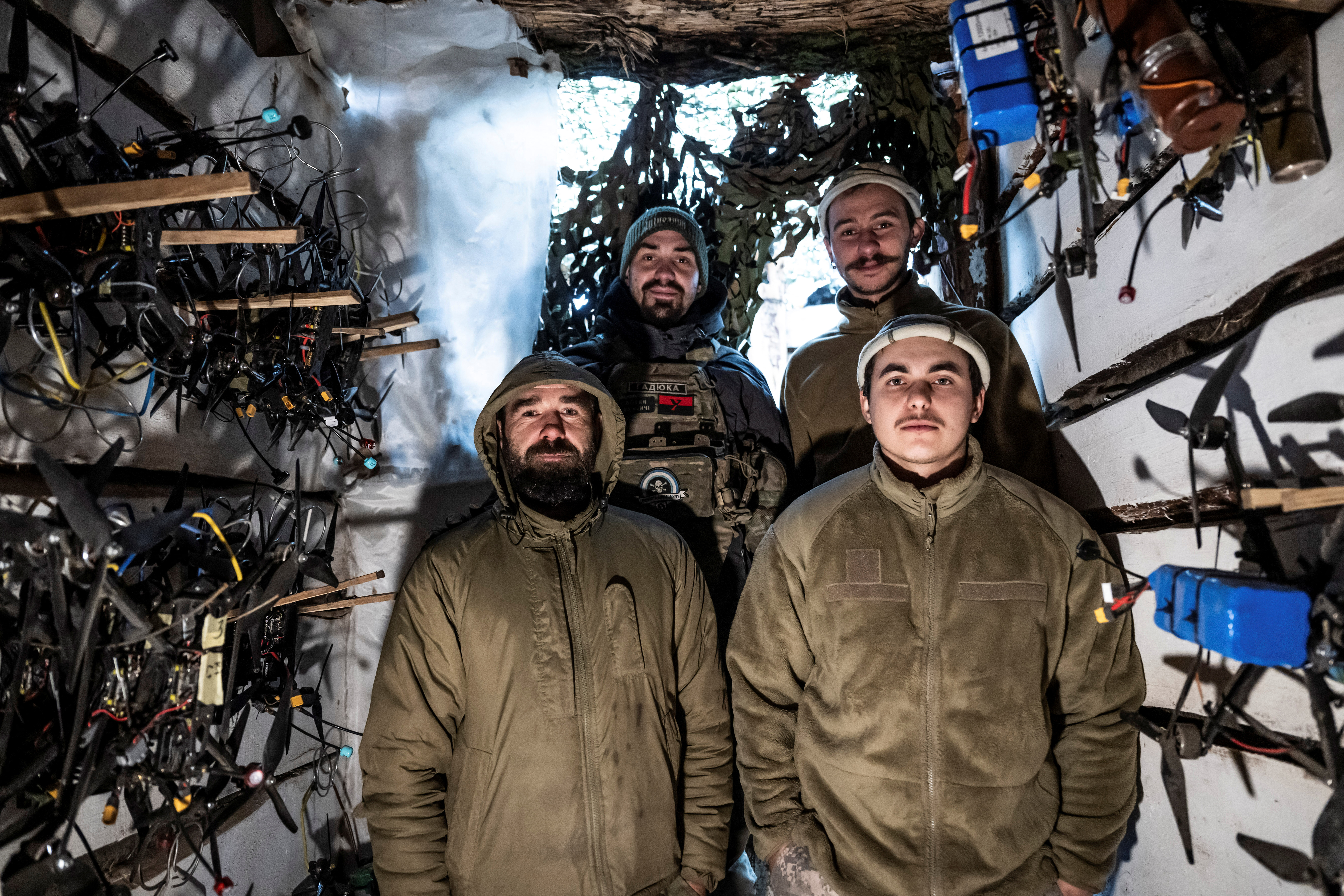 A servicemen, who operate first-person view (FPV) drones, of Da Vinci Wolves Separate Mechanized Battalion, named after Dmytro Kotsiubailo, of the 59th mechanized brigade of the Ukrainian Armed Forces, pose for a picture at their position on a front line, amid Russia's attack on Ukraine, near the town of Pokrovsk in Donetsk region, Ukraine October 20, 2024. REUTERS/Viacheslav Ratynskyi
