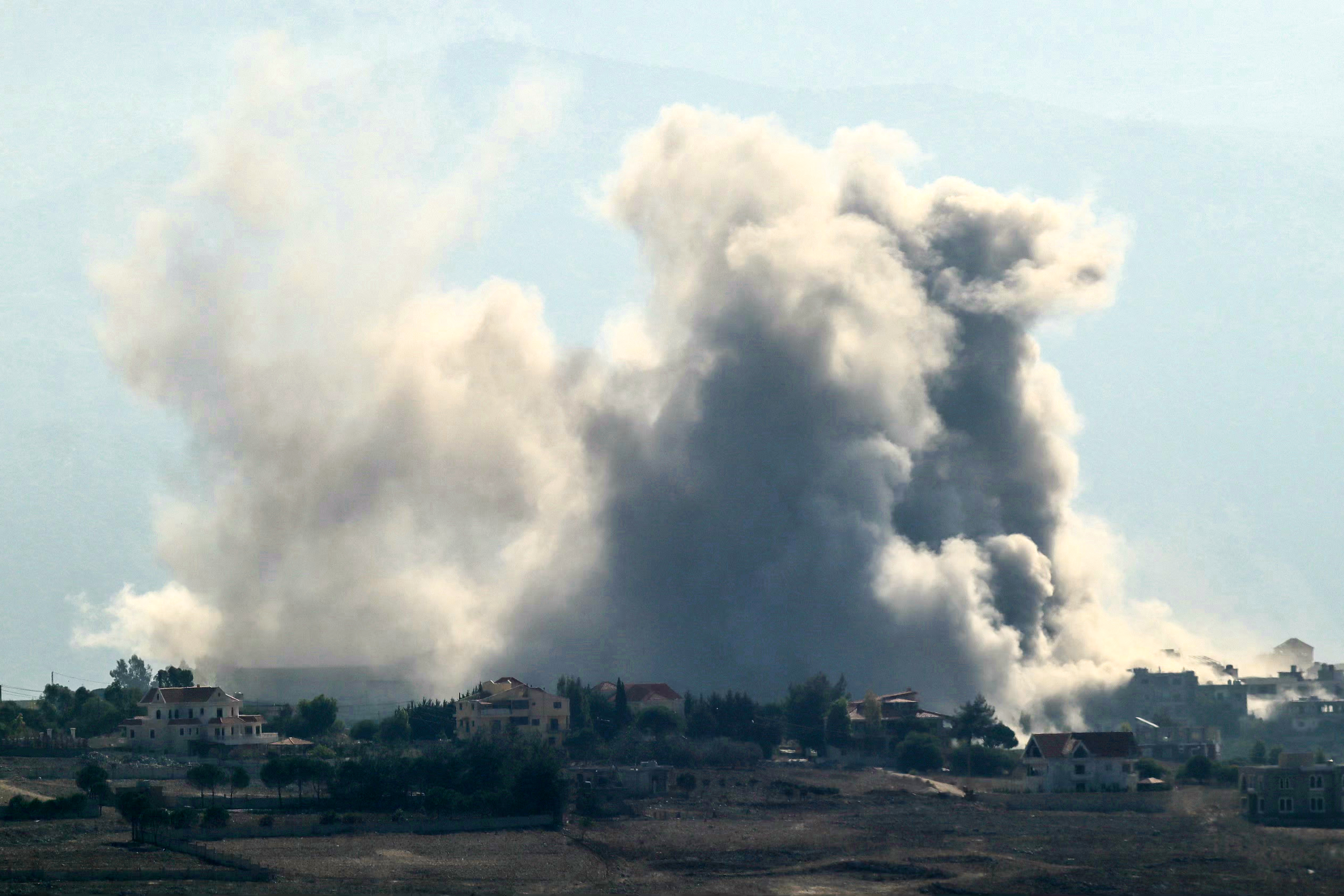 Smoke rises from the site of an Israeli air attack on the southern Lebanese village of Khiam on October 12, 2024.