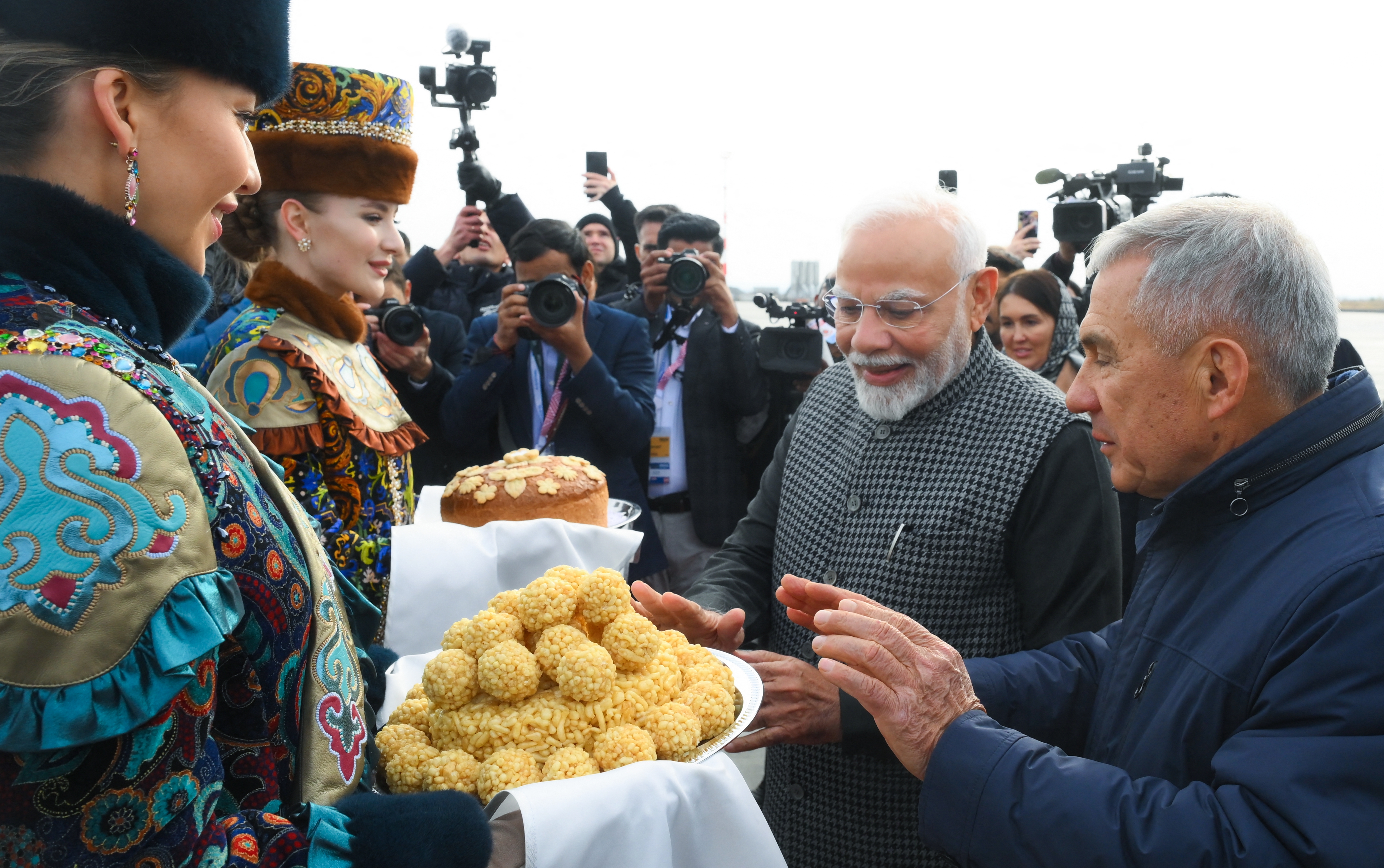 In this handout picture taken and released by Photo host brics-russia2024.ru on October 22, 2024, Indian Prime Minister Narendra Modi arrives at the Kazan airport to attend the BRICS summit, hosted in the city of Kazan from October 22 to 24.