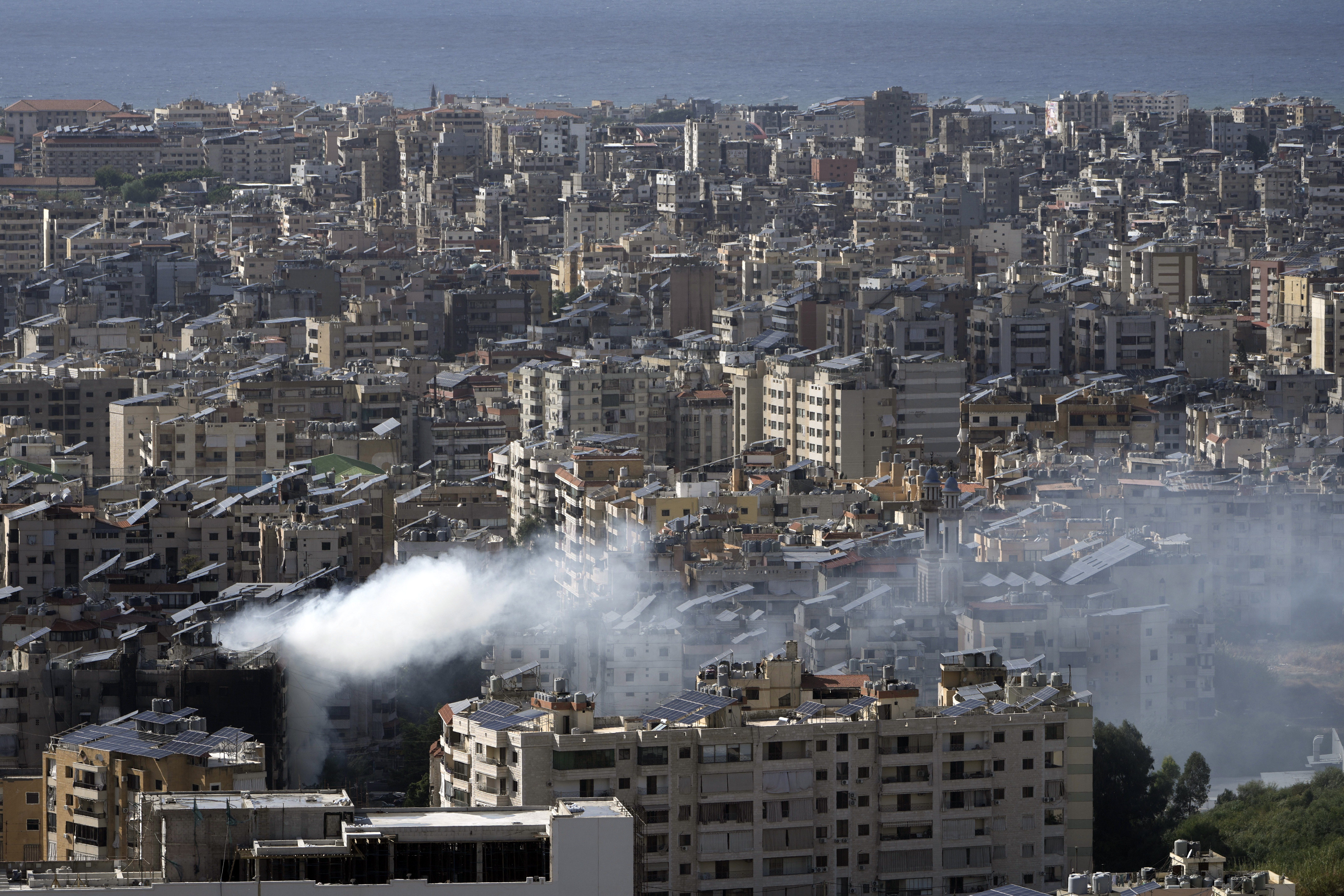 Smoke rises after an Israeli airstrike that hit Dahiyeh suburb, in Beirut, Lebanon, Tuesday, Oct. 1