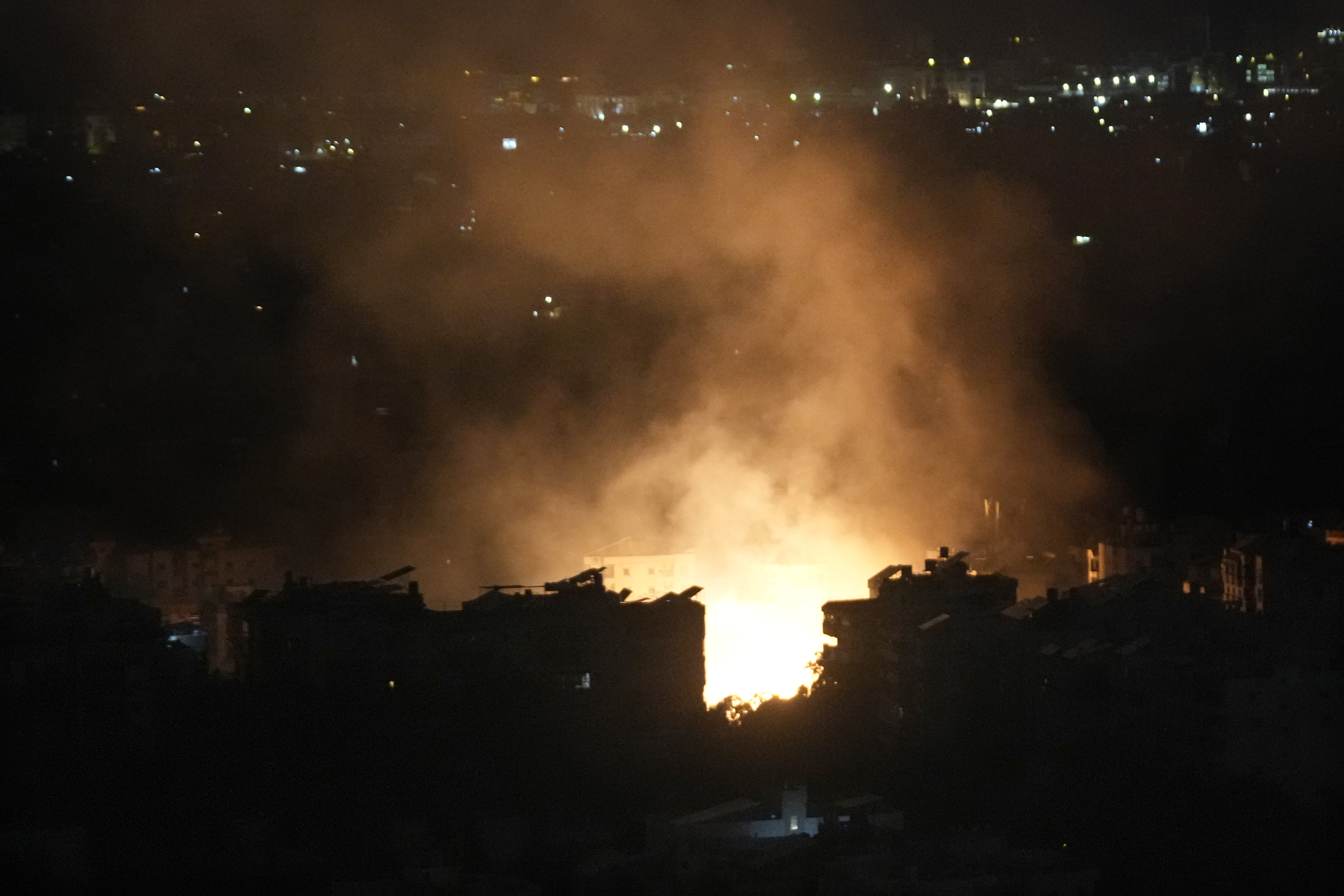 Flame and smoke rise from an Israeli airstrike in Dahiyeh, Beirut, Lebanon, Monday