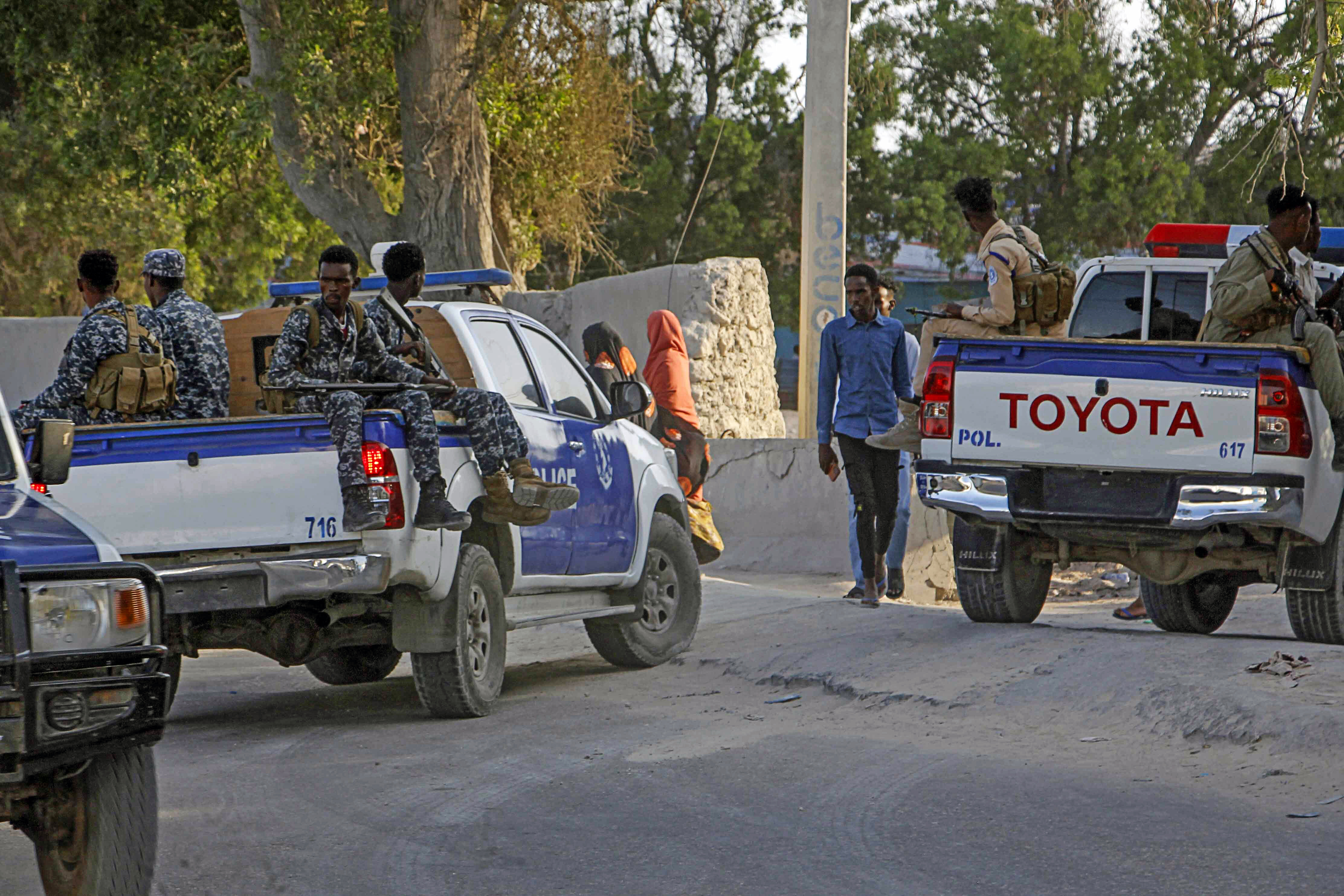 Somalia police patrol near the scene of a suicide bomber attack at a café, in Mogadishu, Somalia, October 17, 2024. [AP Photo/Farah Abdi Warsameh]