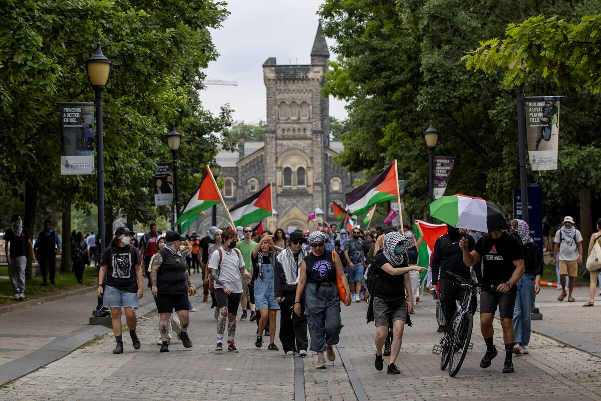 People leave their encampment site after an Ontario judge ordered pro-Palestinian protesters to leave a two-month-old encampment at the University of Toronto, in Toronto, Ontario, Canada on July 3, 2024 [Carlos Osorio/Reuters]