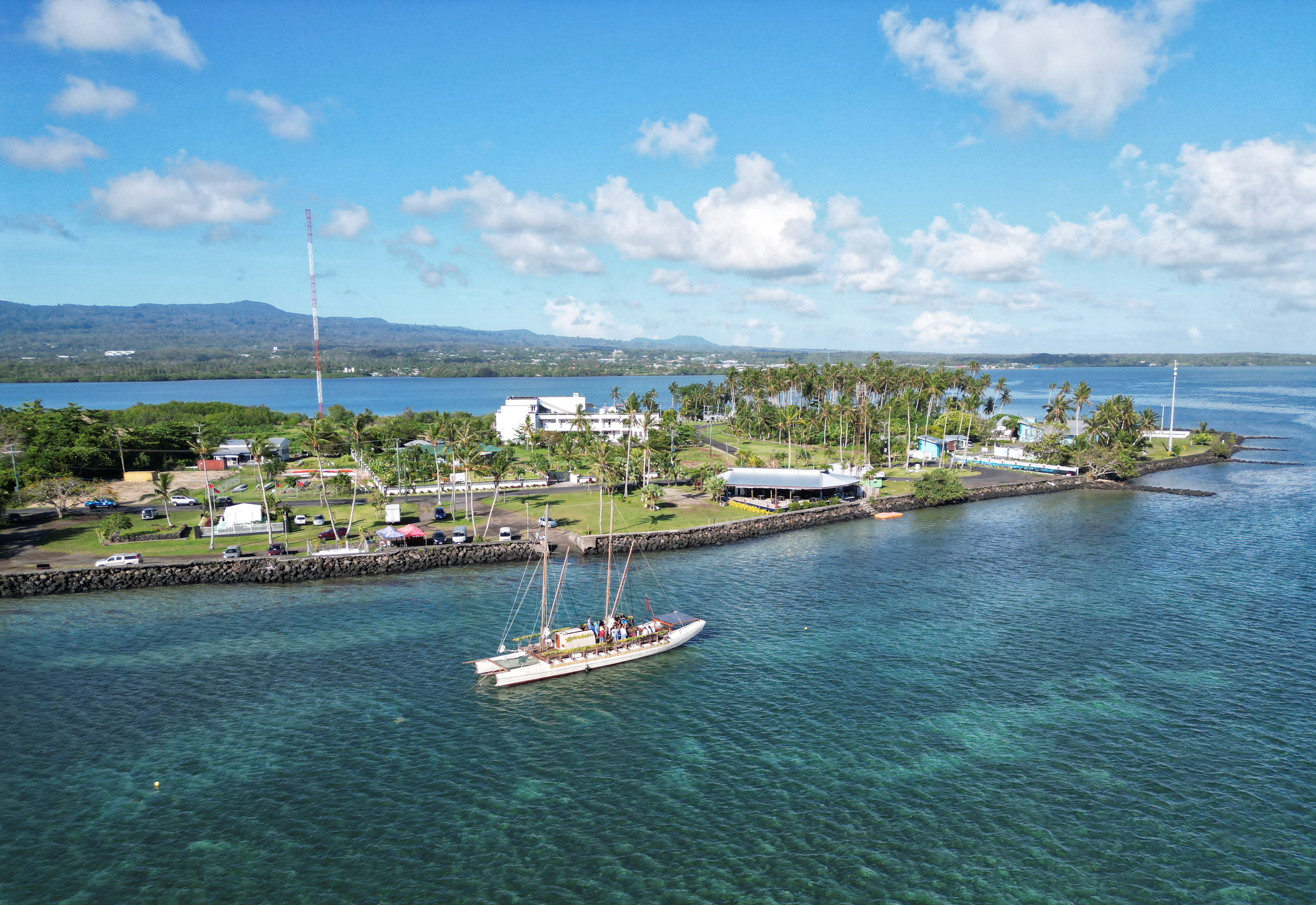 People take part in a workshop on the Samoan traditional canoe, 'Gaualofa', in Apia, Samoa October 22, 2024. REUTERS/James Redmayne