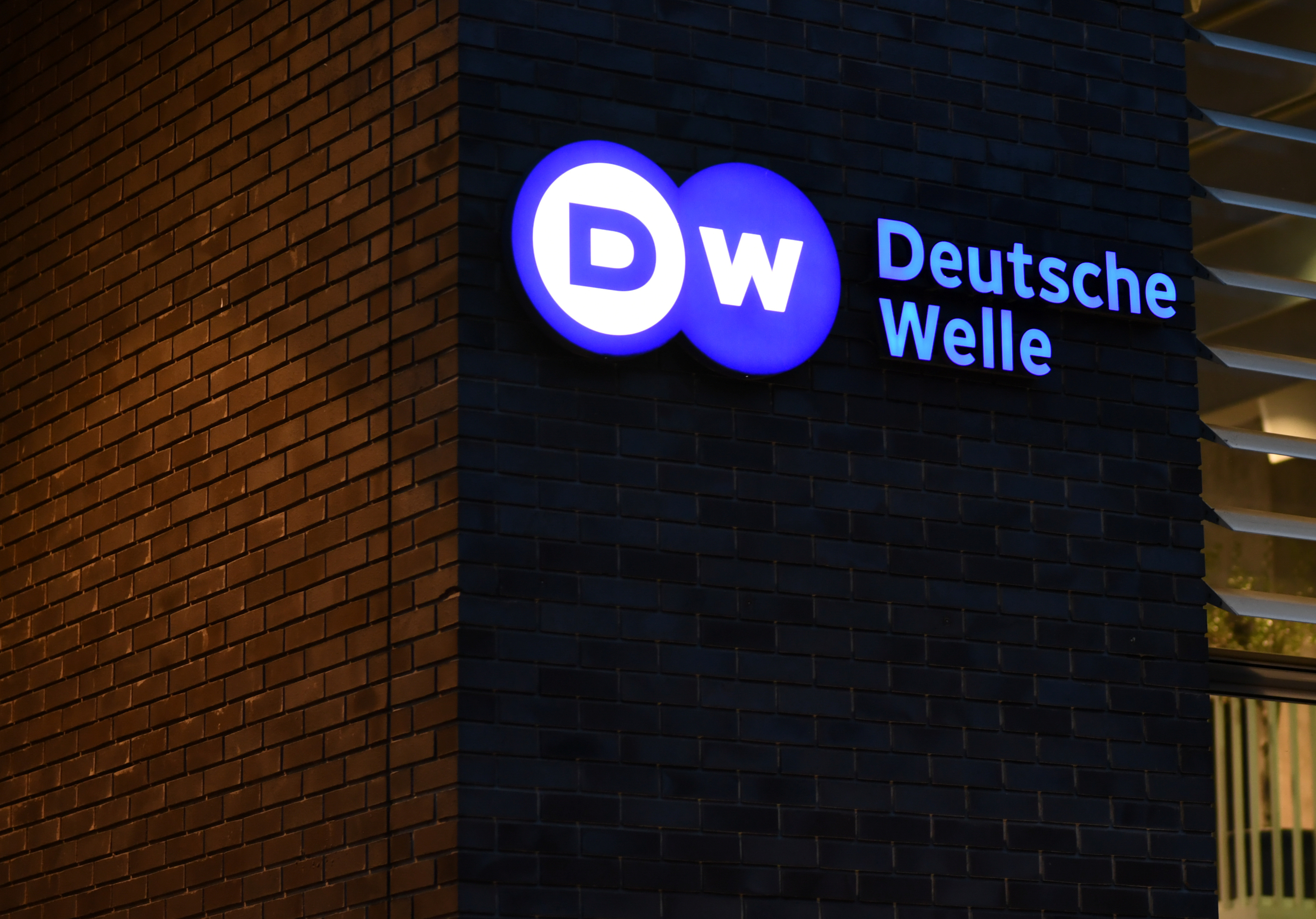 The logo of German international broadcaster Deutsche Welle is pictured in Berlin, Germany, January 30, 2020. Picture taken January 30, 2020. REUTERS/Annegret Hilse
